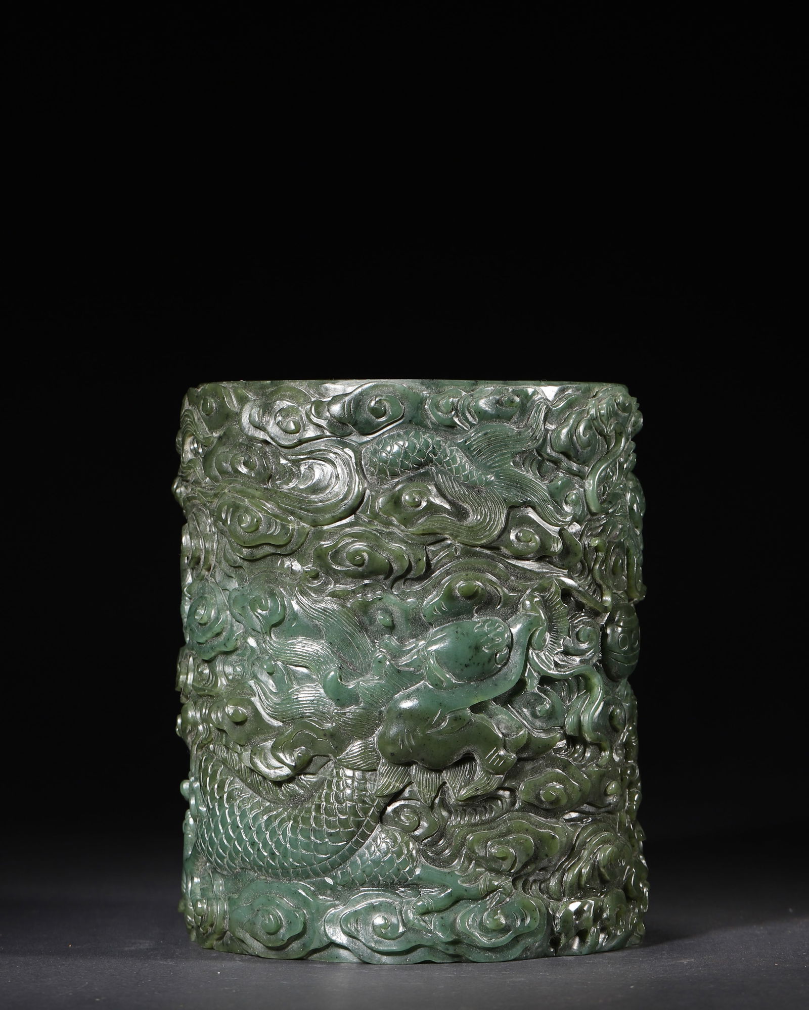 QING DYNASTY, QIANLONG PERIOD, SPINACH JADE BRUSH POT CARVED WITH CLOUD AND DRAGON MOTIFS (1 of 7)