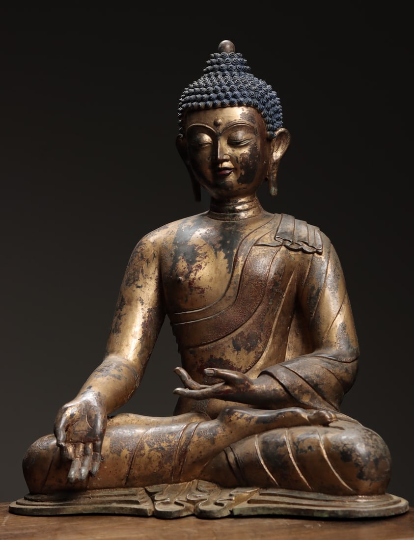 GILT-BRONZE SEATED FIGURE OF SHAKYAMUNI BUDDHA, MING DYNASTY (1 of 7)