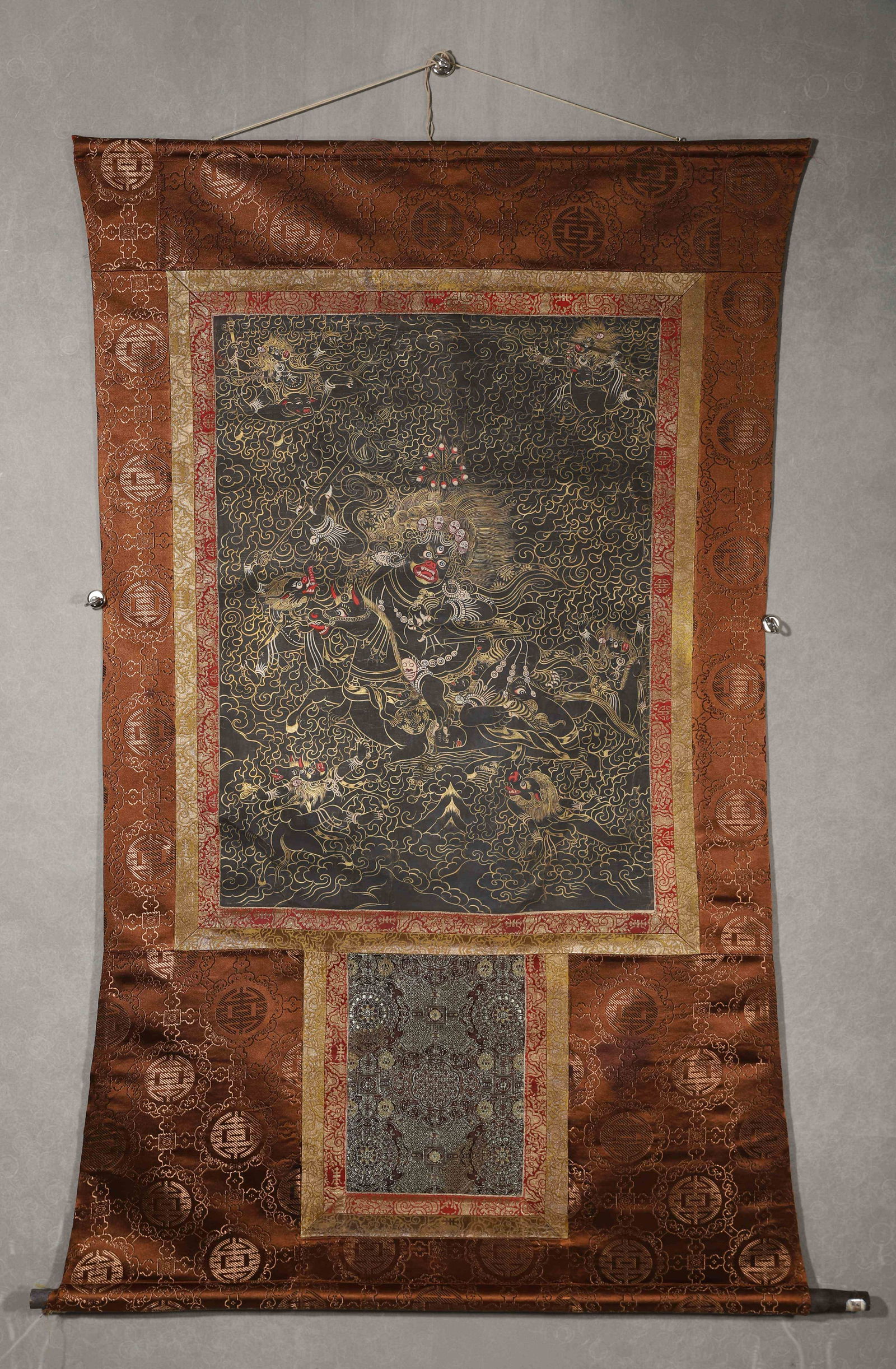 MID-18TH CENTURY, QING DYNASTY, A TIBETAN BLACKGROUND THANGKA OF PALDEN LHAMO WITH GOLD TRACES (1 of 11)