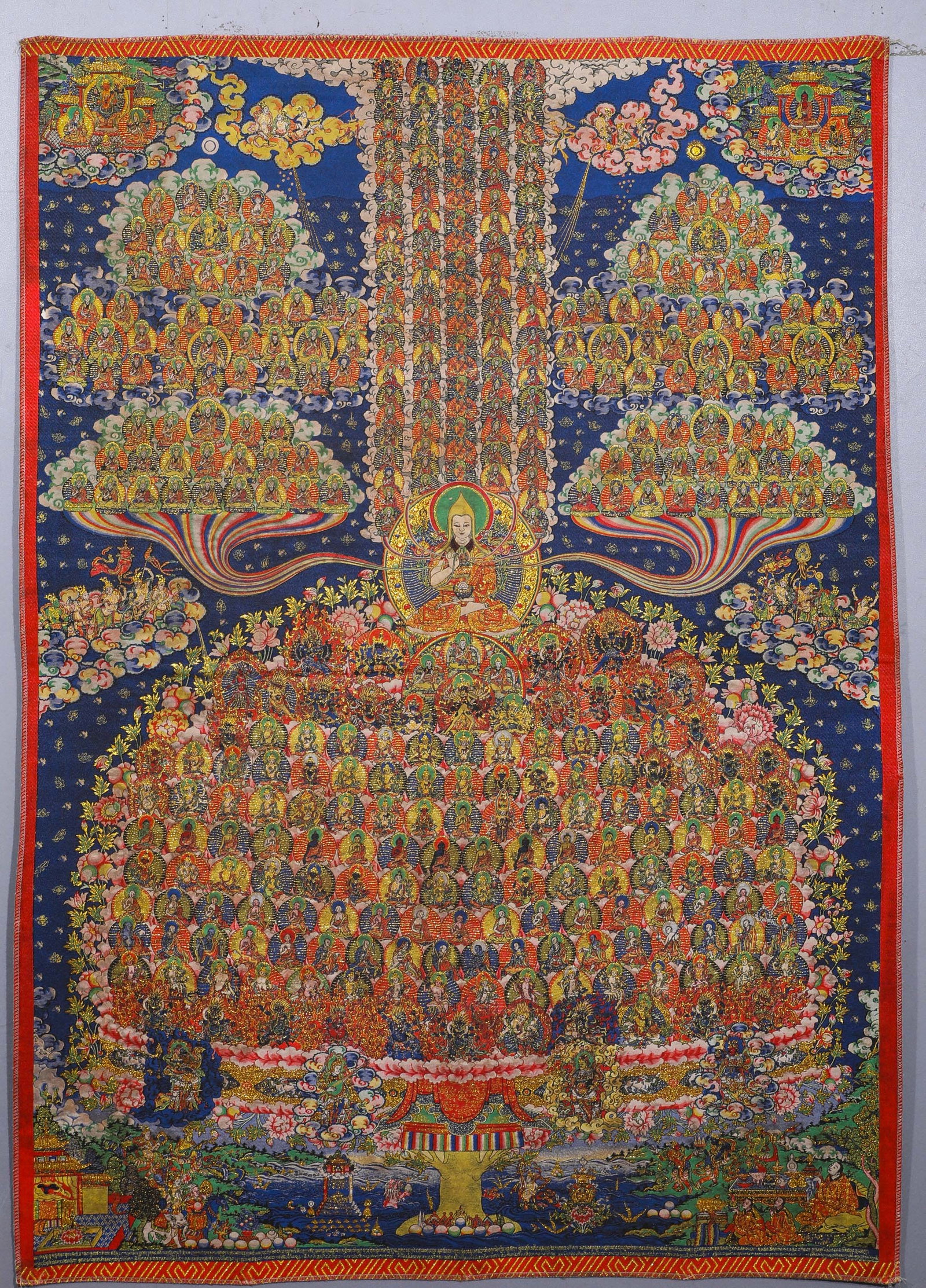 GELUG SCHOOL MASTERS OFFER EMBROIDERED THANGKA: H:99cmW:72cmThis is a Gelugpa Refuge Field Thangka, a core Tibetan Buddhist artwork for meditating on the refuge lineage in the Gelug tradition.