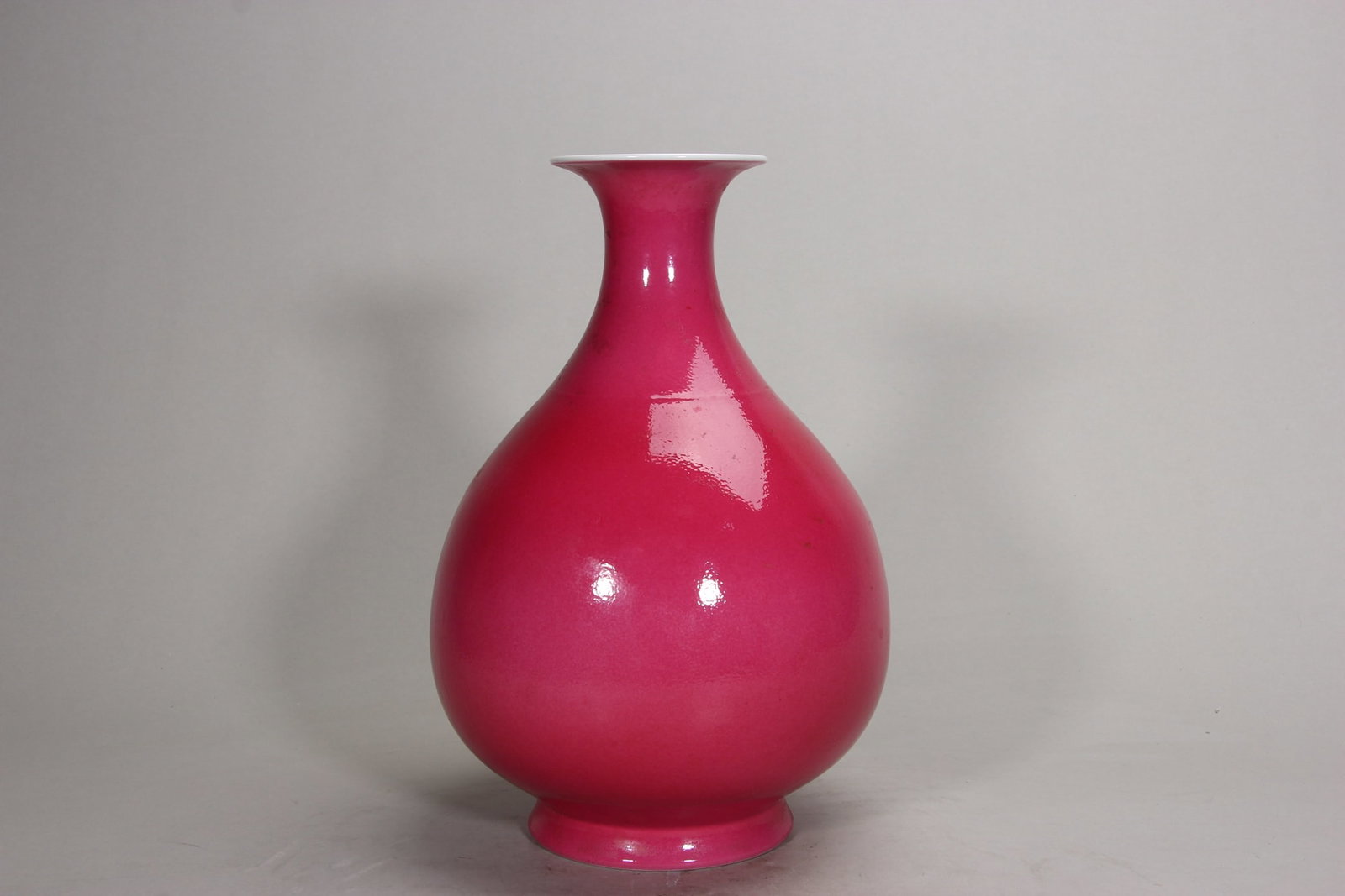 A FINE QING XUANTONG PERIOD CARMINE-RED GLAZED YUHUCHUNPING VASE (1 of 10)