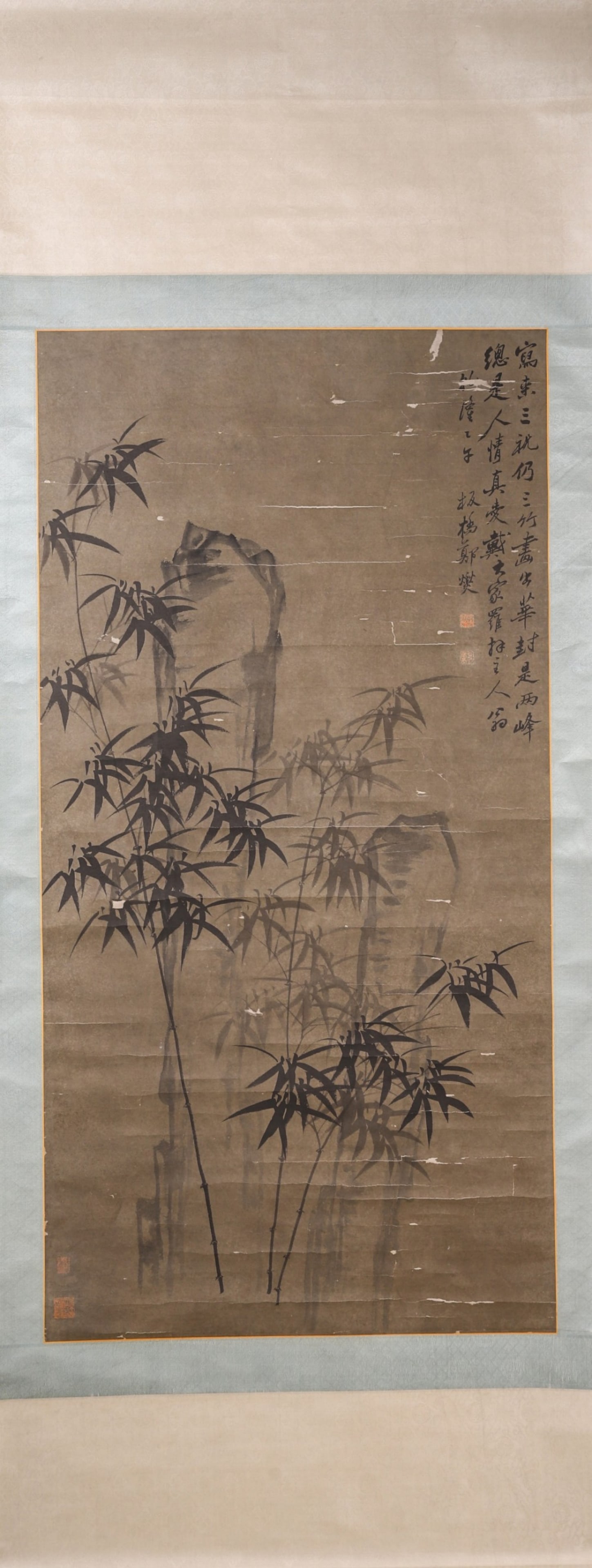 A Paper Ink Painting "Bamboo and Rocks" Attributed to Zheng Xie, Qing Dynasty: Core L 136cm (53.54 in); Core W 69cm (27.17 in)An ink bamboo and rock painting on paper attributed to Zheng Xie of the Qing Dynasty, depicting bamboo and rocks with vigorous and elegant brushwork. It 