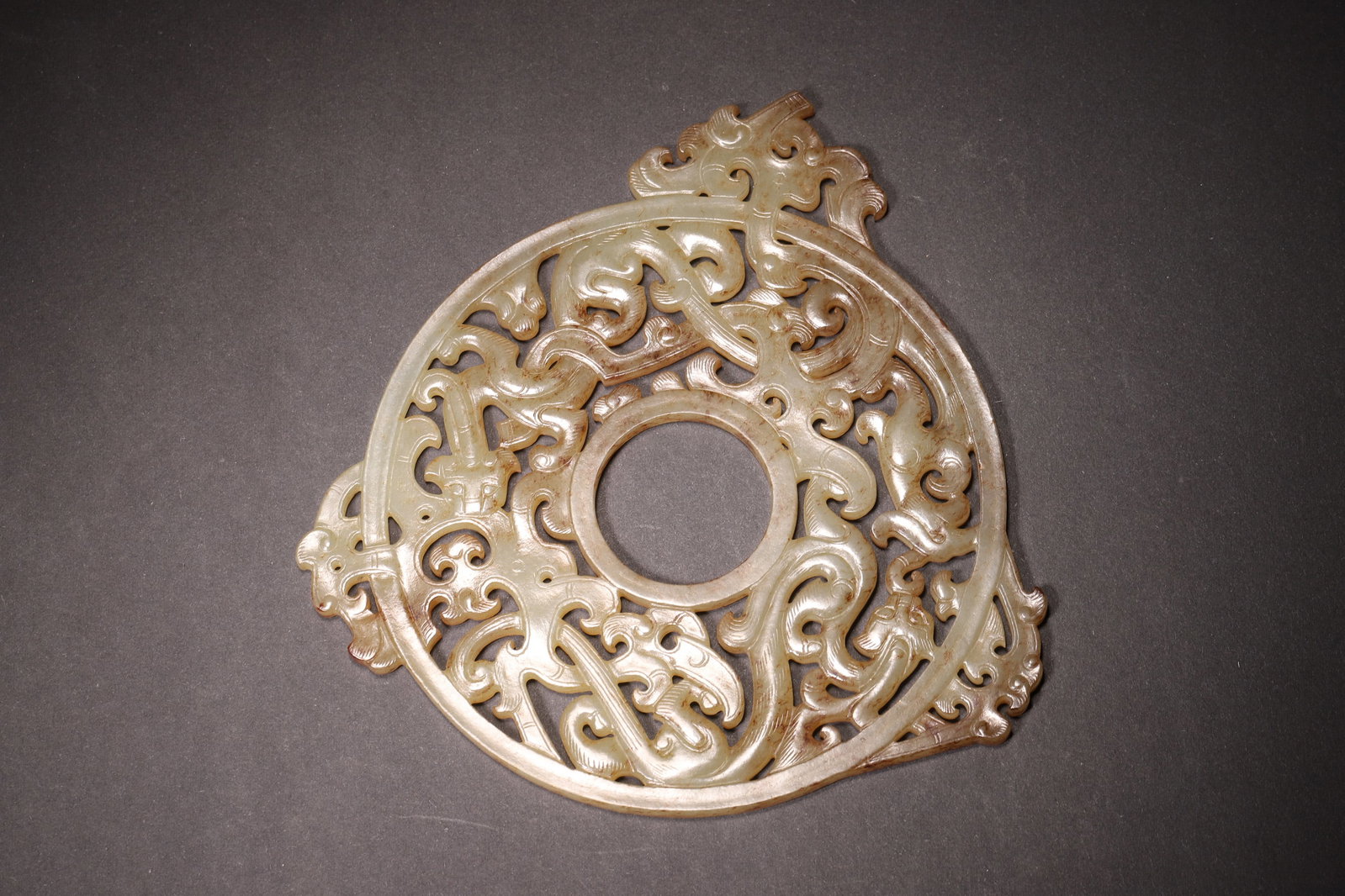 A Hetian Jade Outlined Dragon and Phoenix Bi Disc - Han Dynasty (1 of 7)
