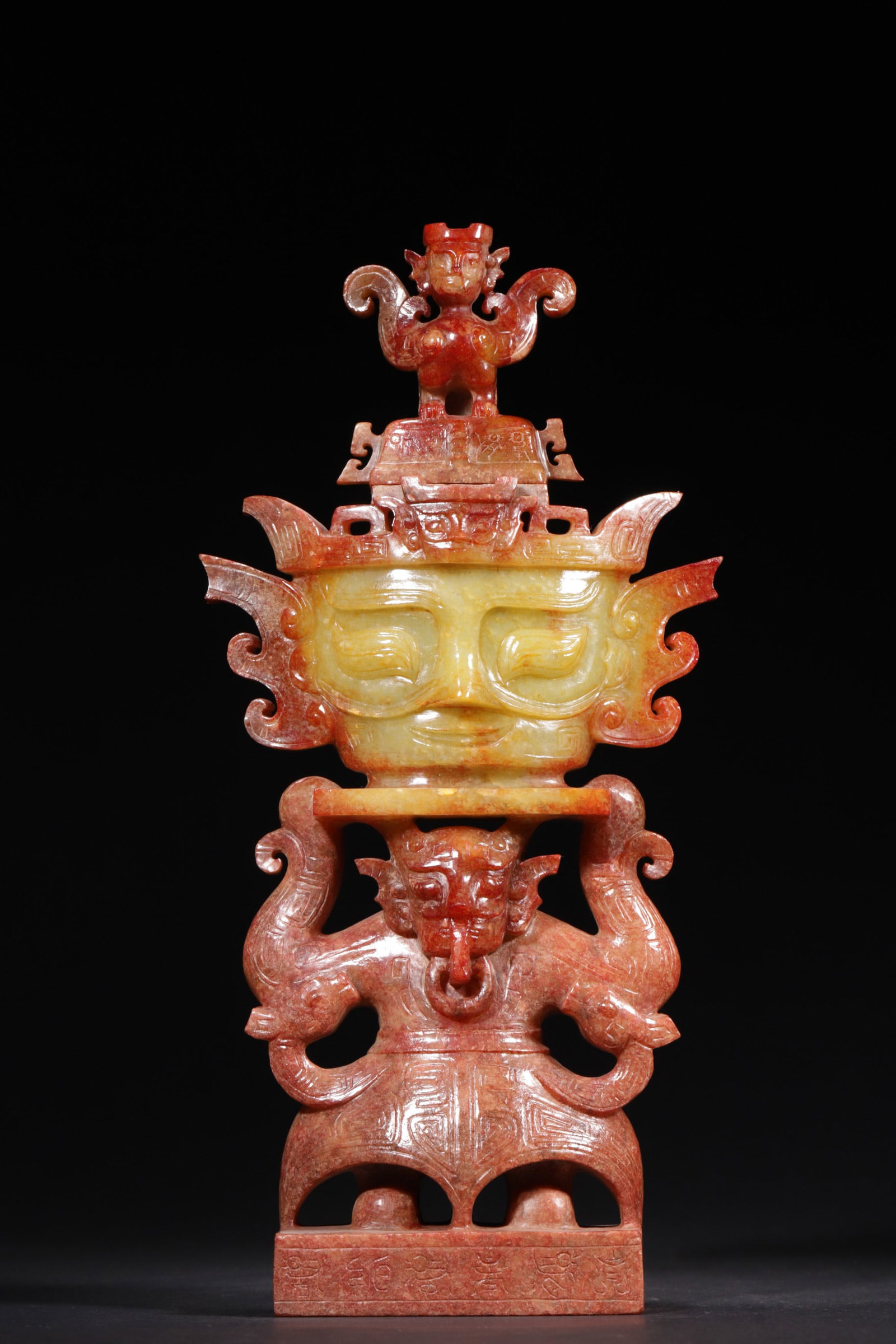 An Ancient Jade Ornament with Deity Motifs: Length 16.0cm (6.3in), Width 7.0cm (2.76in), Height 33.0cm (12.99in), Weight 2802.0g (6.18lb)This high ancient jade ornament is elaborately carved with deity and beast motifs. It features a three-tier