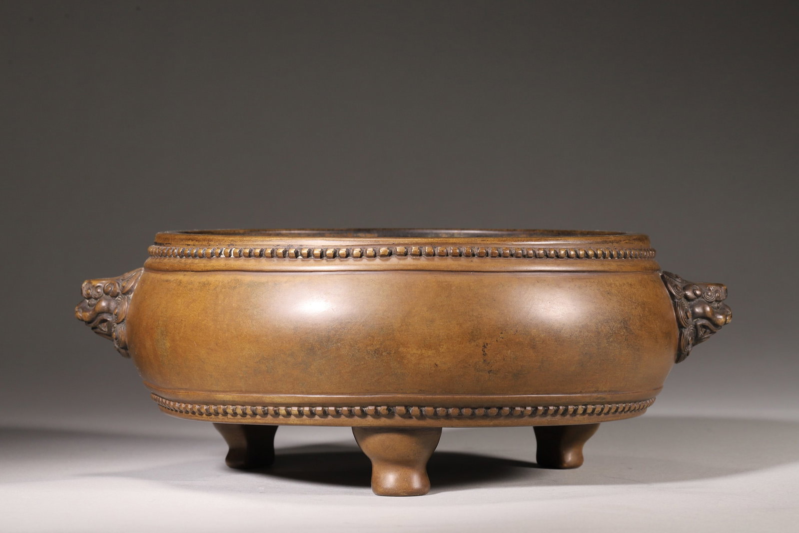 A Ming Dynasty Drum-Shaped Bronze Censer with Lion Handles, Chongzhen Mark (1 of 7)