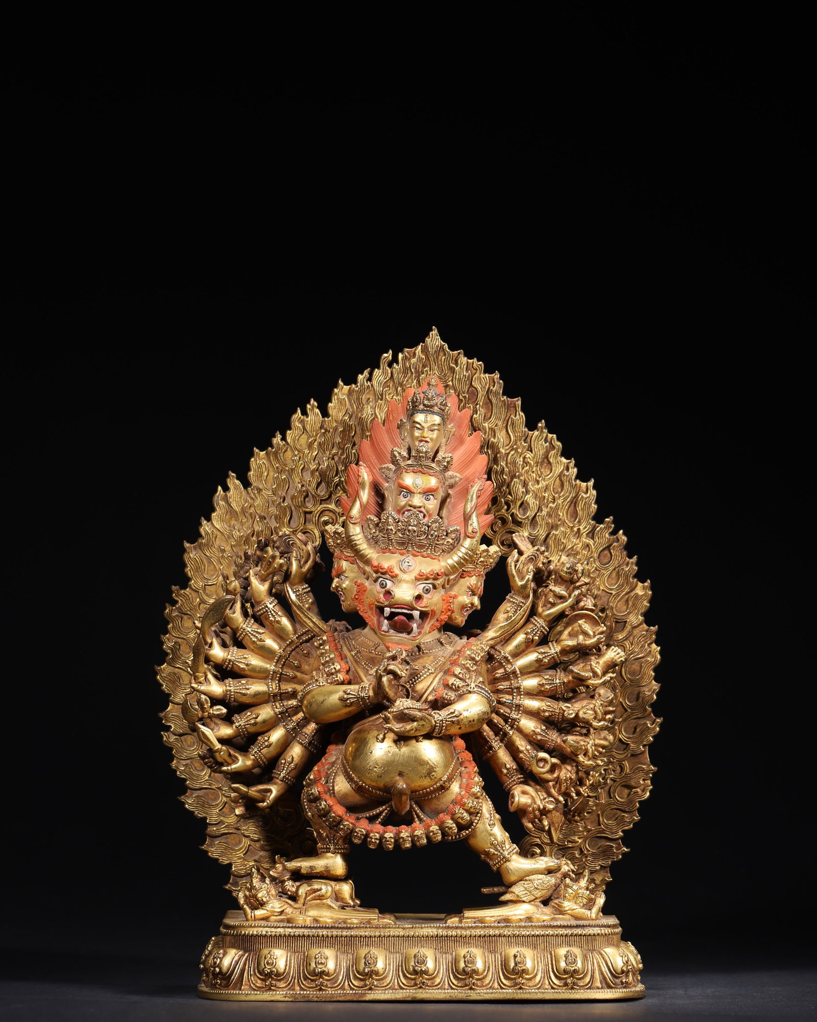 A Gilt-Bronze Statue of Yamantaka, Qing Dynasty: 2803.0 g (6.18 lb) | 18.0 x 9.0 x 23.0 cm (7.09 x 3.54 x 9.06 in)This Qing Dynasty gilt-bronze statue of Yamantaka features a majestic and awe-inspiring appearance. With nine heads, thirty-four arms a