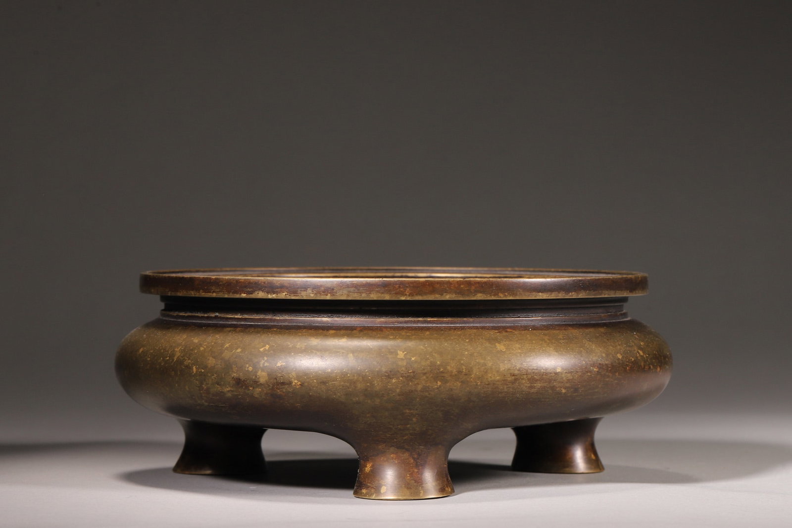A Bronze Three-Foot Incense Burner with "Yingwei Zhai Zhi" Mark, Qing Dynasty (1 of 7)
