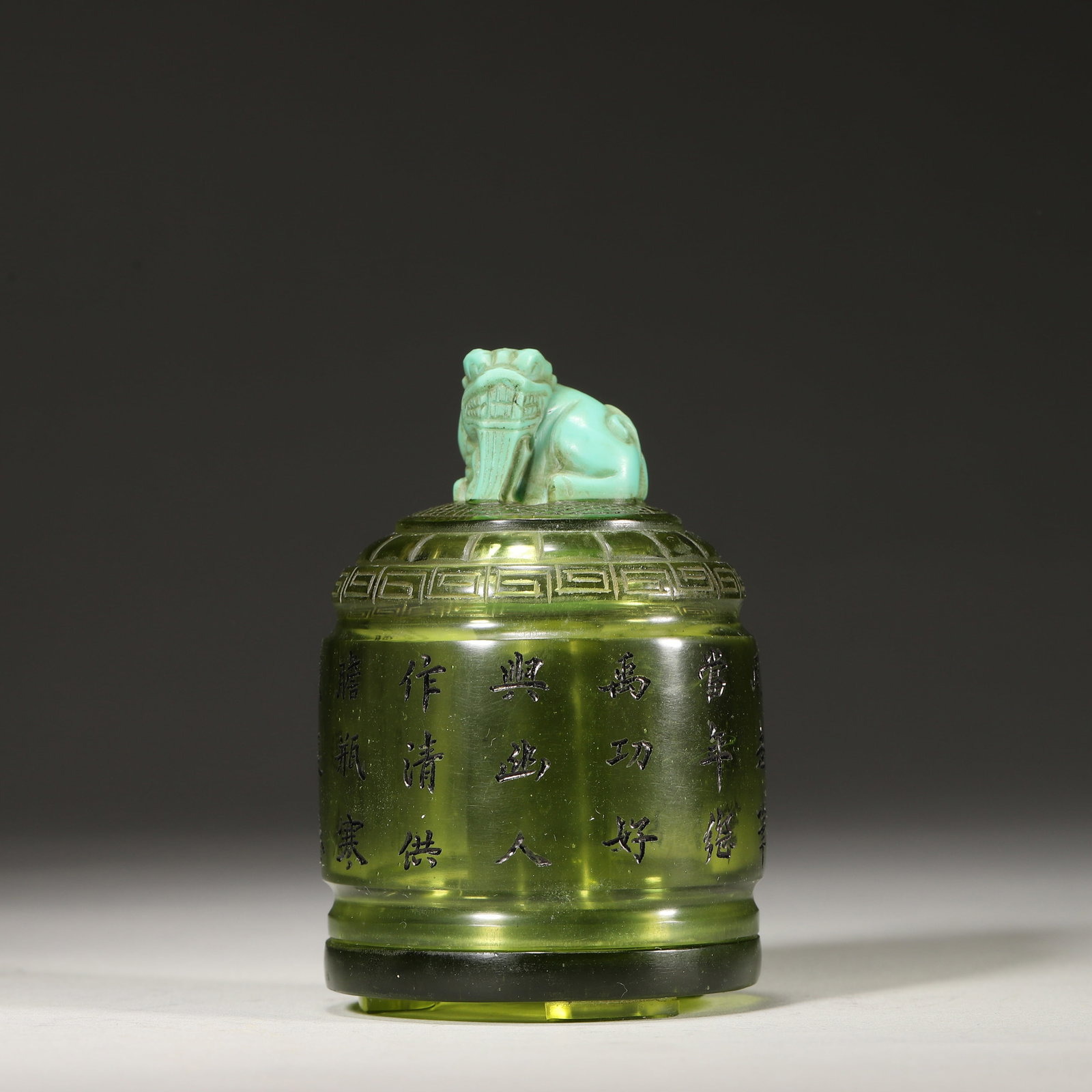 An Agate Beast Mask Archer's Ring and a Green Glass Archer's Ring Case with "Qianlong Nian Zhi - 4