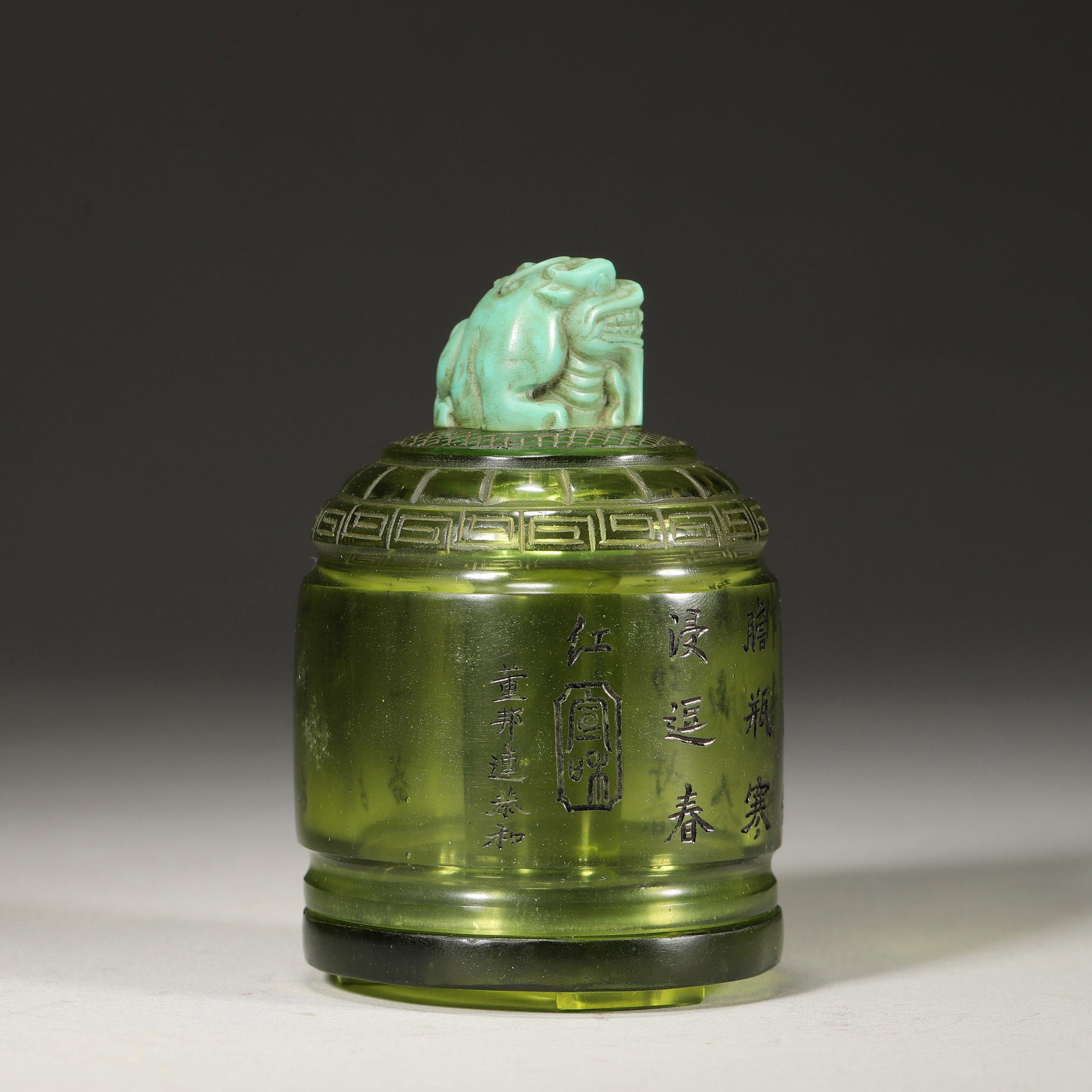 An Agate Beast Mask Archer's Ring and a Green Glass Archer's Ring Case with "Qianlong Nian Zhi - 5