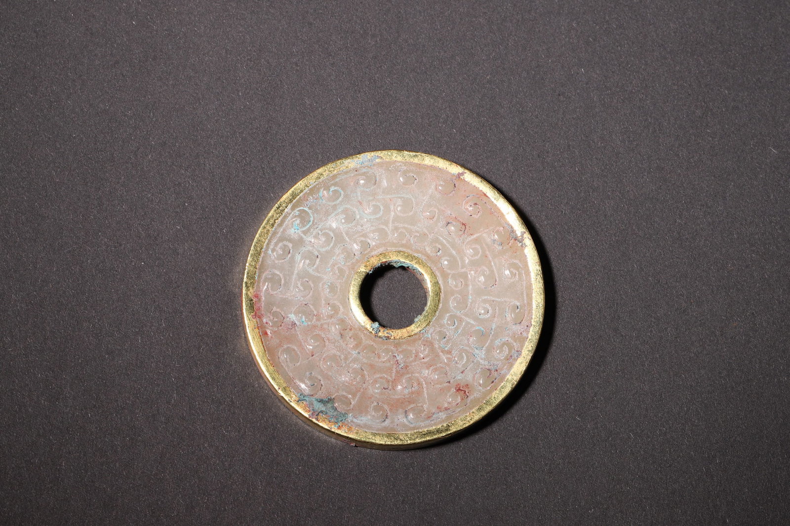 A Jade Bi Disc with Gilt Bronze Rim and Cloud Pattern - Han Dynasty (1 of 6)