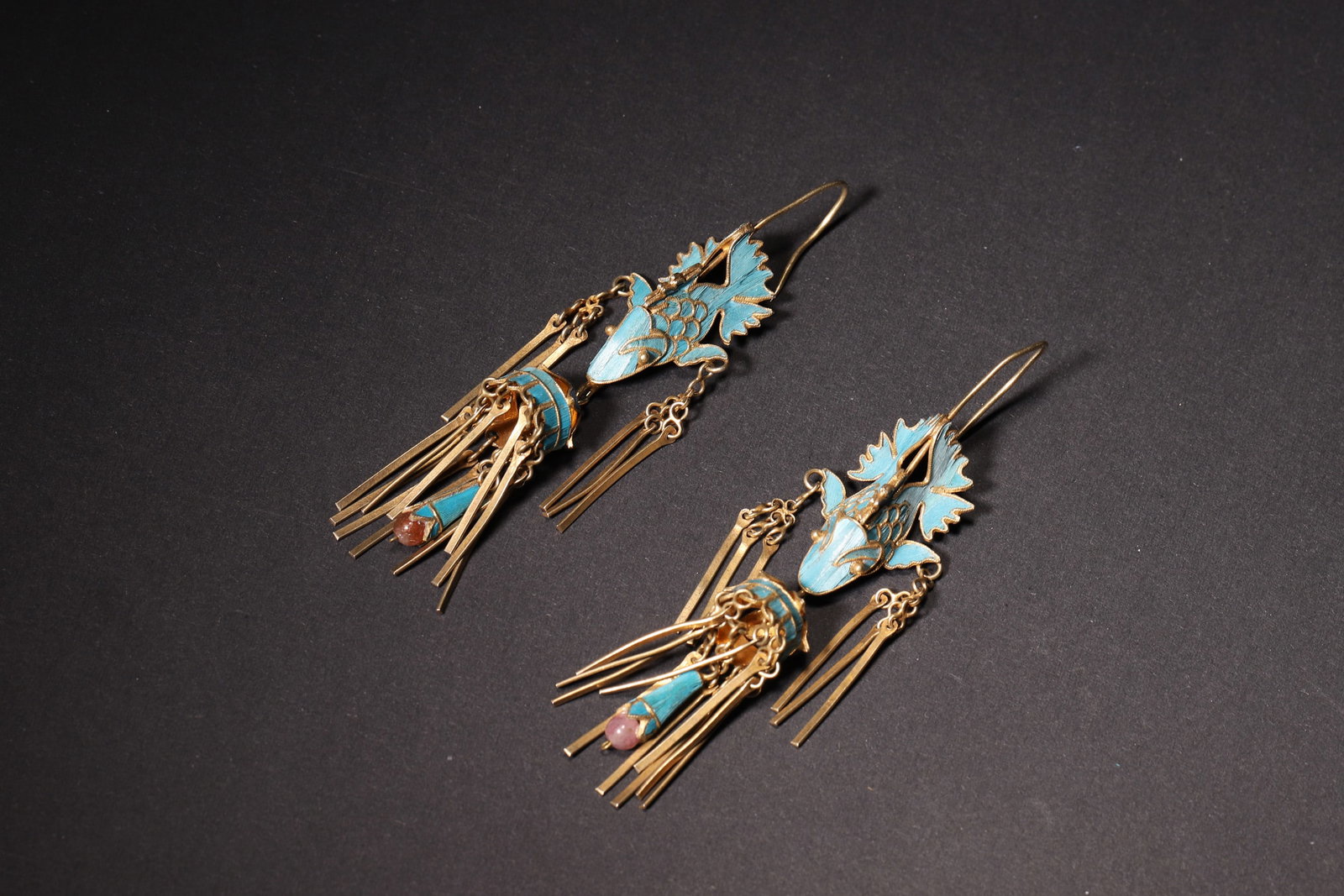 A Pair of Silver-Gilt Kingfisher Feather Fish Tassel Earrings (Qing Dynasty): Length 9.0cm (3.54in), Width 2.0cm (0.79in), Weight 18.0g (0.04lb)This pair of Qing Dynasty earrings is crafted from silver-gilt with kingfisher feather and gemstone inlay. They feature elaborate fish