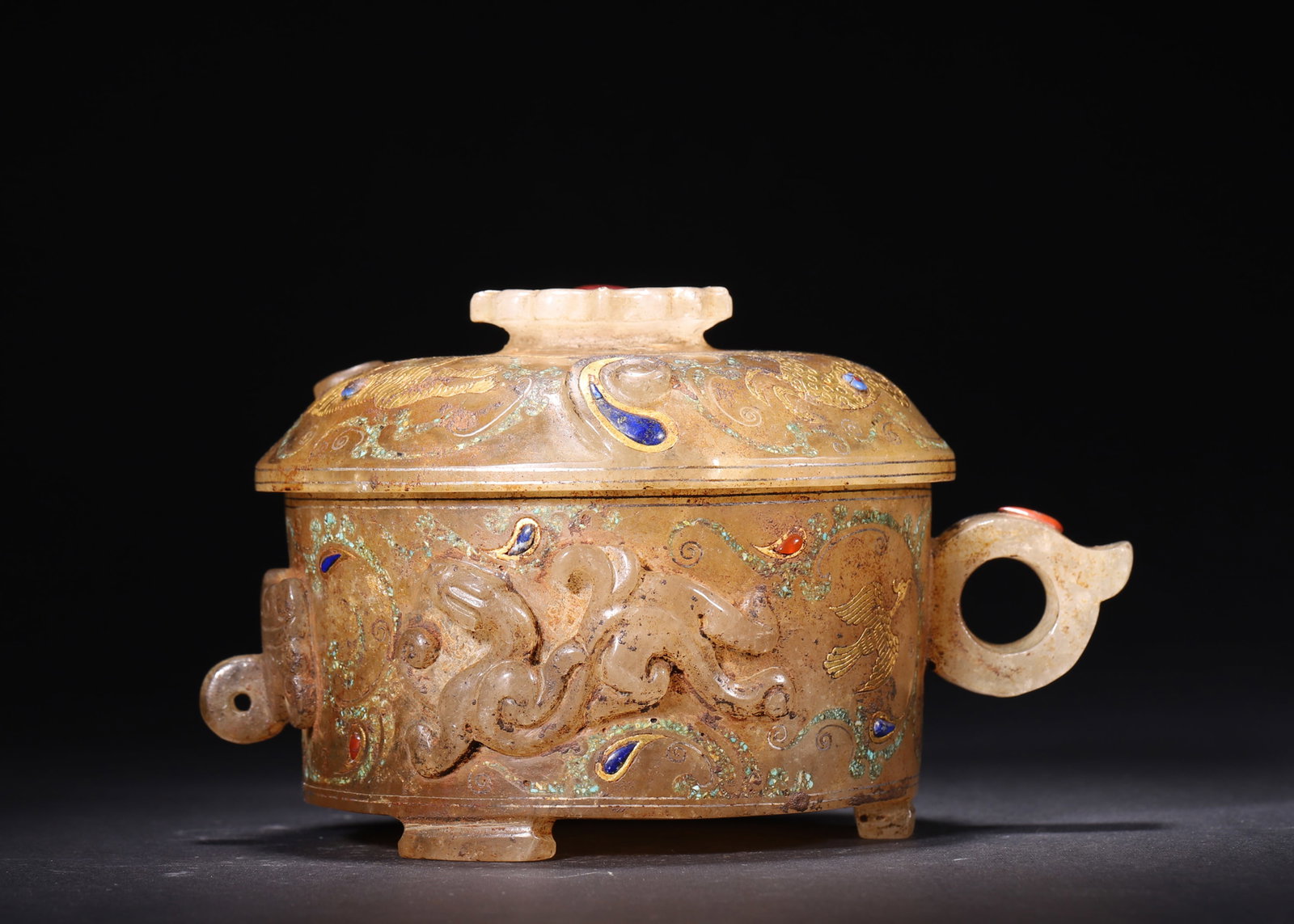A Crystal Cup with Gold and Silver Inlay and Gemstone Inlay, Han Dynasty: L 17cm (6.69 in); W 13cm (5.12 in); H 10cm (3.94 in); Wt 1072g (2.36 lb)This Han Dynasty crystal covered cup is carved from natural crystal. Decorated with carved beast patterns, gold and silver inlay