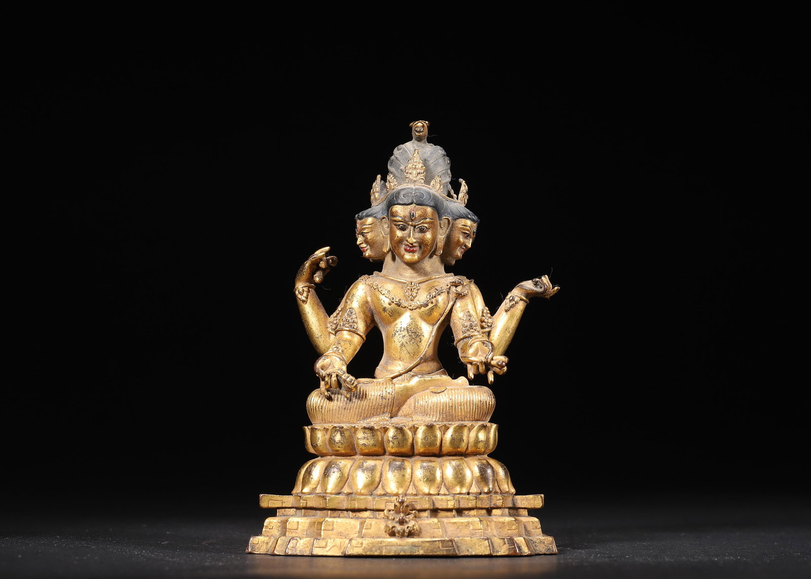 A Gilt-bronze Three-faced Six-armed Deity with Serpent Crown, Qing Dynasty (1 of 8)