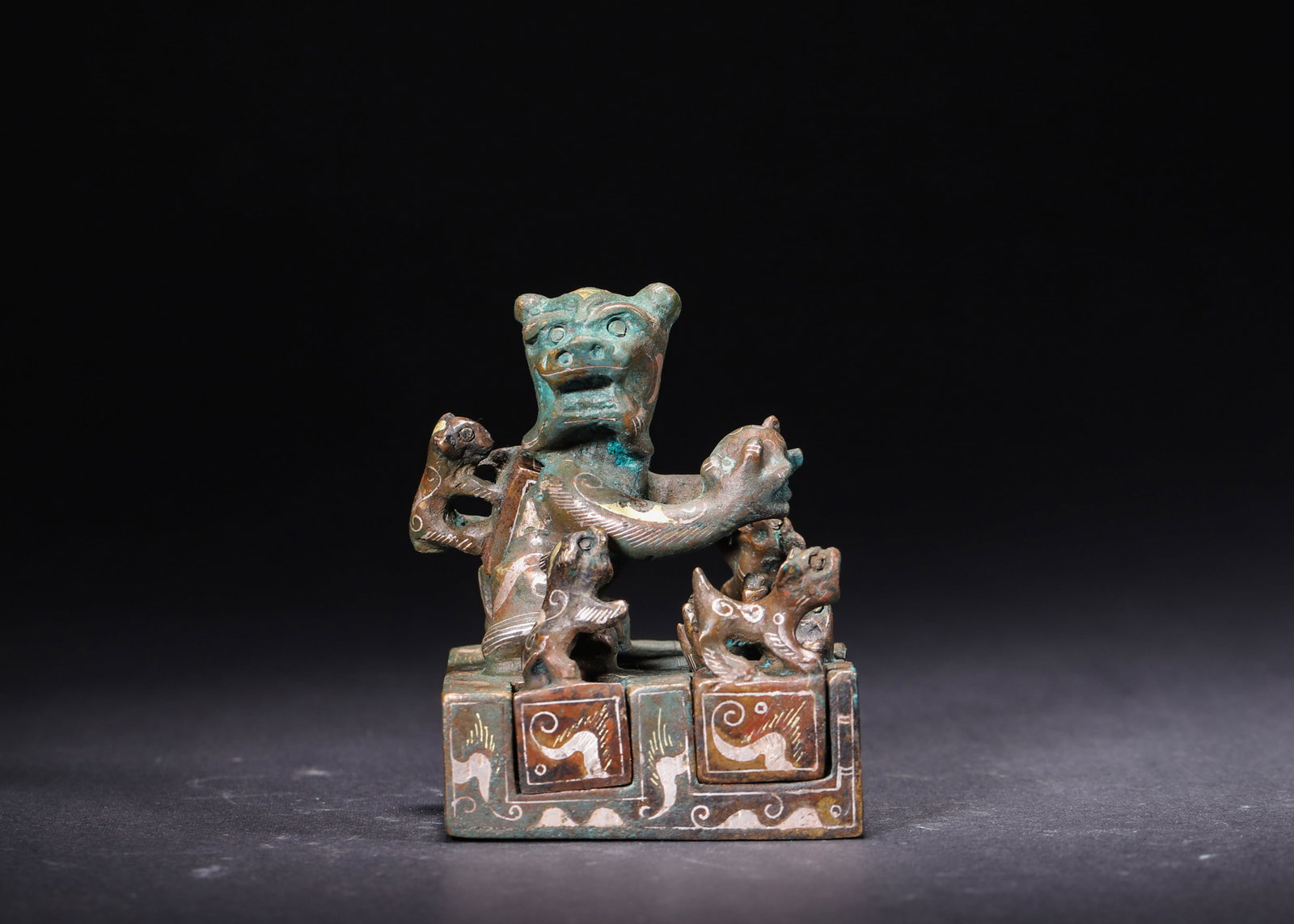 A Set of Bronze Auspicious Beast Seals with Gold and Silver Inlay, Han Dynasty (1 of 9)