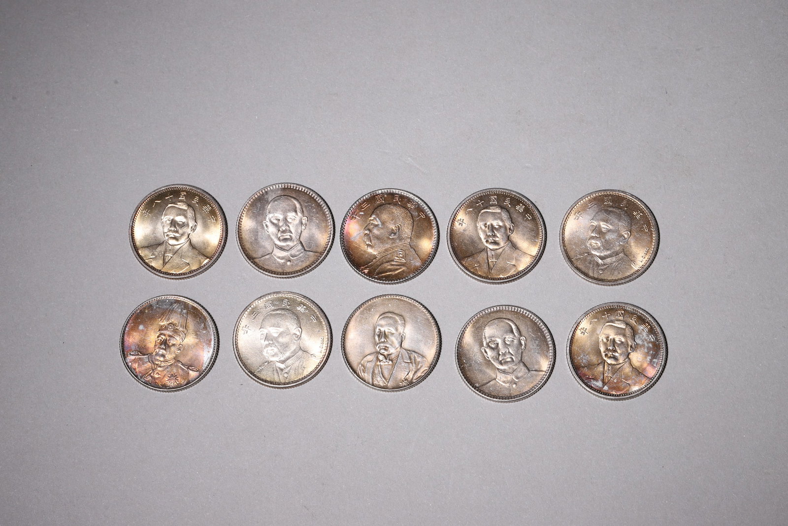 Ten Silver Coins with Portraits of Sun Yat-sen and Yuan Shikai: Diameter 2.3cm (0.91in), Weight 54.0g (0.12lb)This set contains ten fine silver coins engraved with lifelike portraits of Sun Yat-sen and Yuan Shikai. The reverse displays delicate grain and double fl