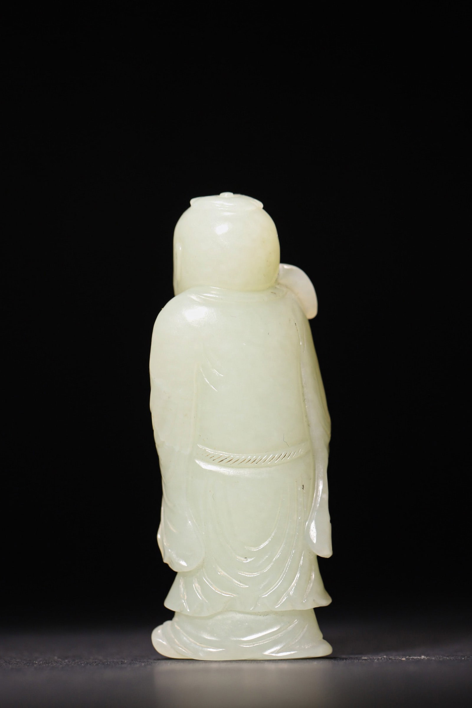 A Hetian Greenish White Jade Figure of an Immortal Holding Ruyi - Qing Dynasty - 5