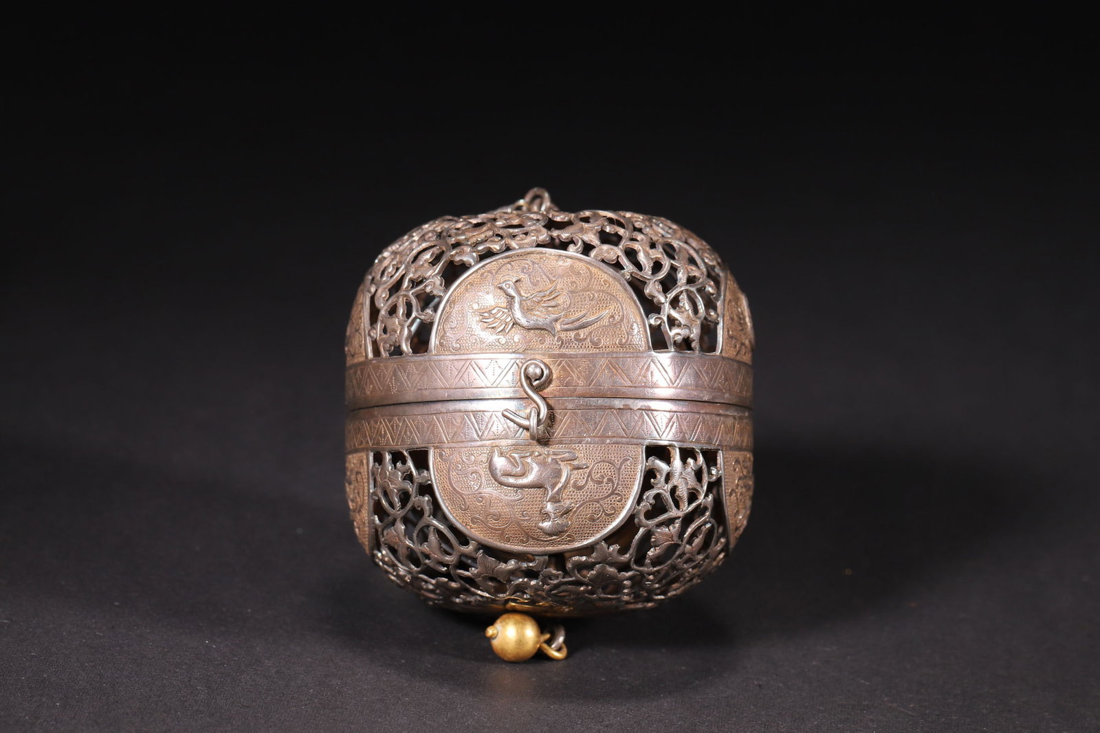A Tang Dynasty Silver Censer with Gold Gilding and Openwork Floral and Bird Pattern: Diameter 6.0cm (2.36in), Height 6.4cm (2.52in), Weight 86.0g (0.19lb)A Tang Dynasty Silver Censer with Gold Gilding and Openwork Floral and Bird Pattern