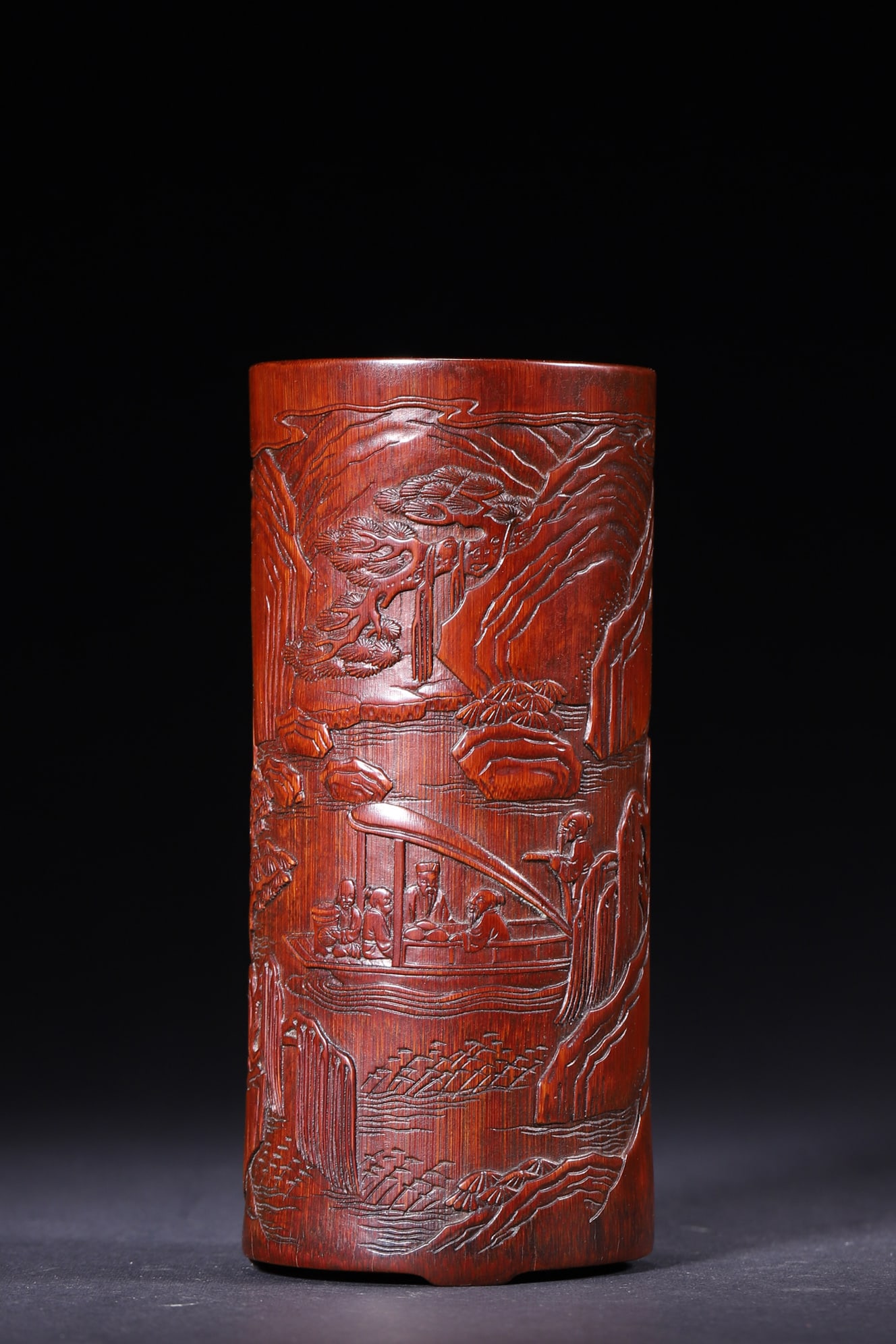 A Qing Dynasty Bamboo Brush Pot with "Red Cliff Boat Trip" Scene, Signed Zhiyan: Diameter 6.0cm (2.36in), Height 13.0cm (5.12in), Weight 136.0g (0.3lb)This is a Qing Dynasty bamboo brush pot carved with the "Red Cliff Boat Trip" scene, signed "Zhiyan". With fine relief carvings of