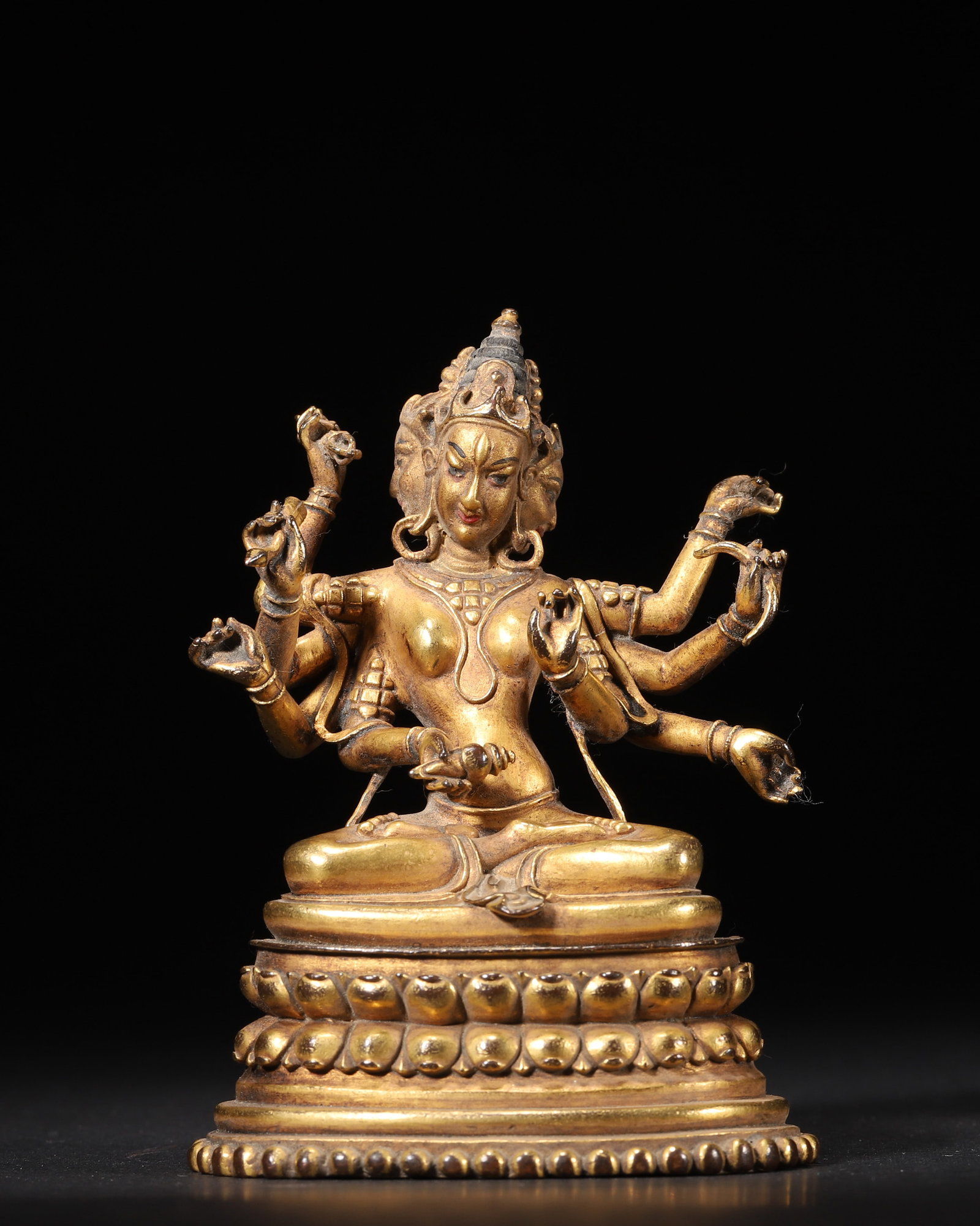 A Gilt Bronze Seated Statue of Ushnisha Vijaya with Three Faces and Eight Arms, Qing Dynasty (1 of 8)