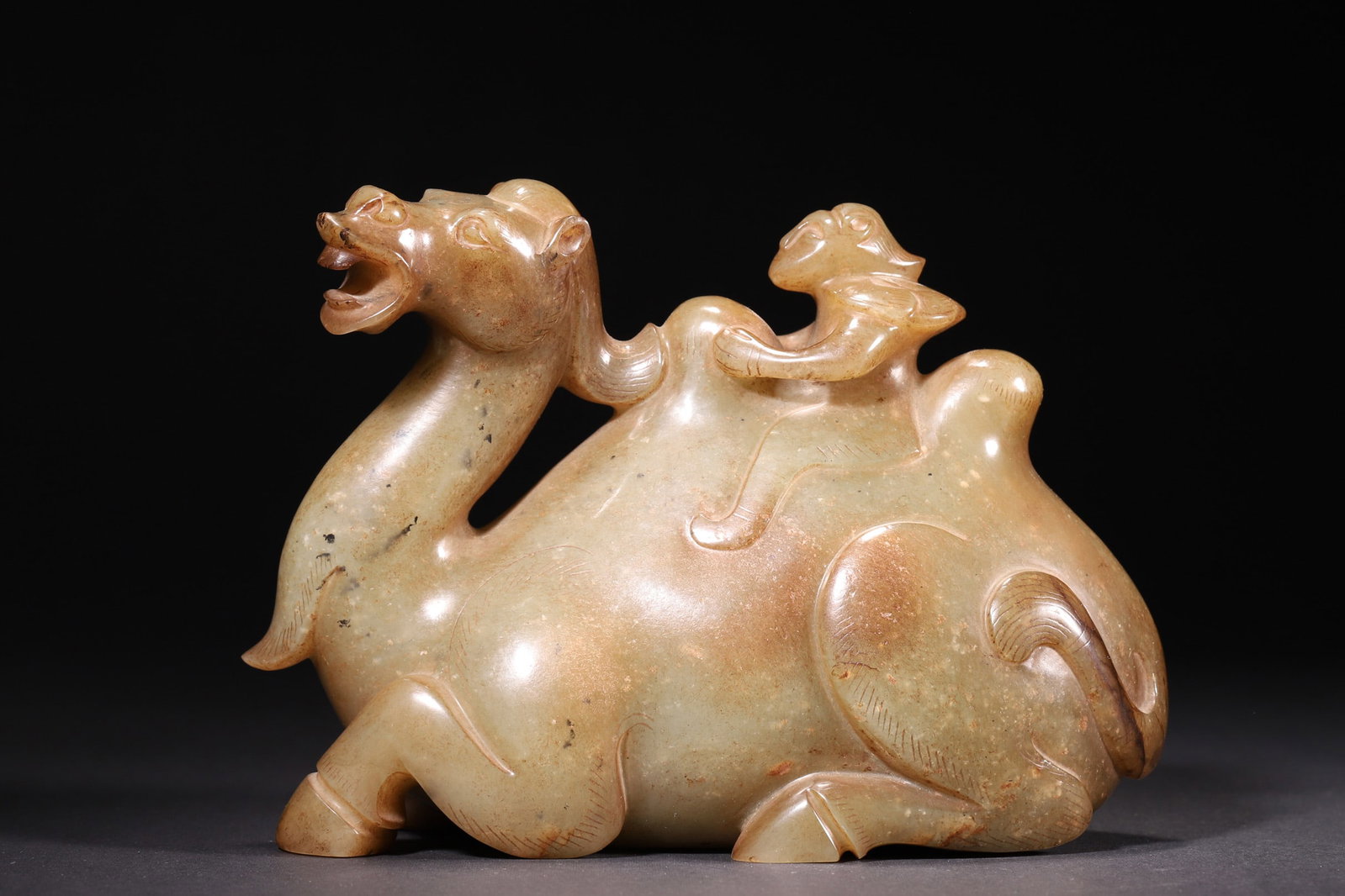 A Hetian Jade "Hu Rider on Camel" Ornament, Han Dynasty (1 of 7)