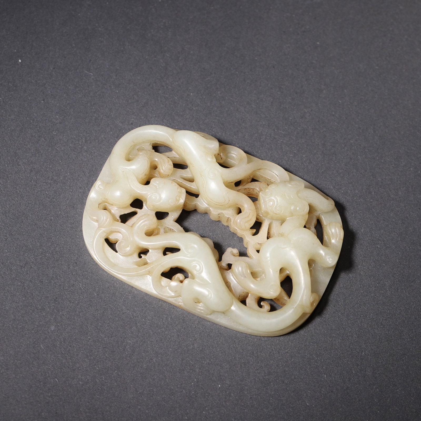 A Hetian Jade Openwork Three-Chilong Inlay, Yuan Dynasty (1 of 7)