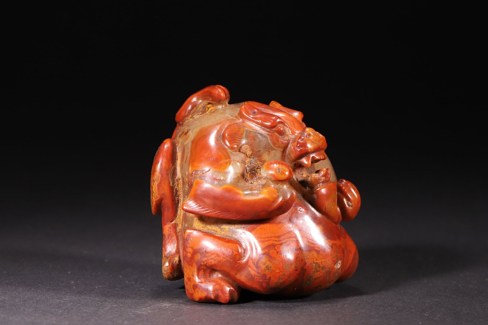 A Han Dynasty Red Agate Auspicious Beast Paperweight - 2