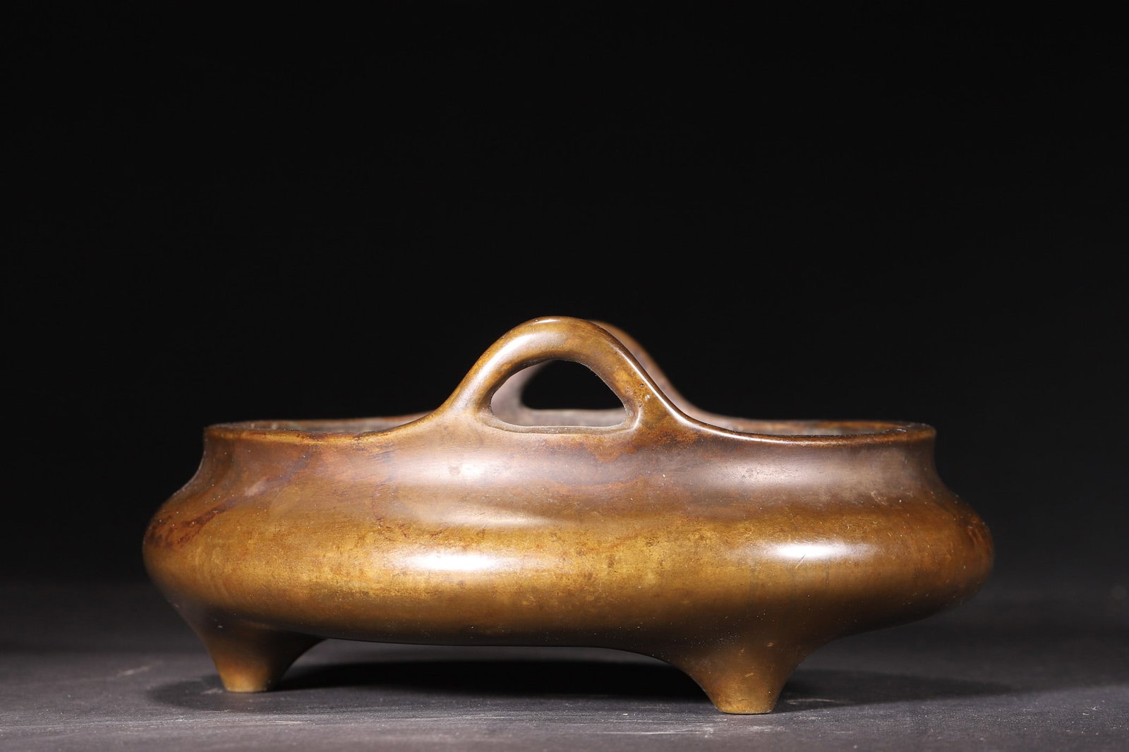 A Qing Dynasty Bronze Incense Burner with Three Legs and Upright Handles - 2