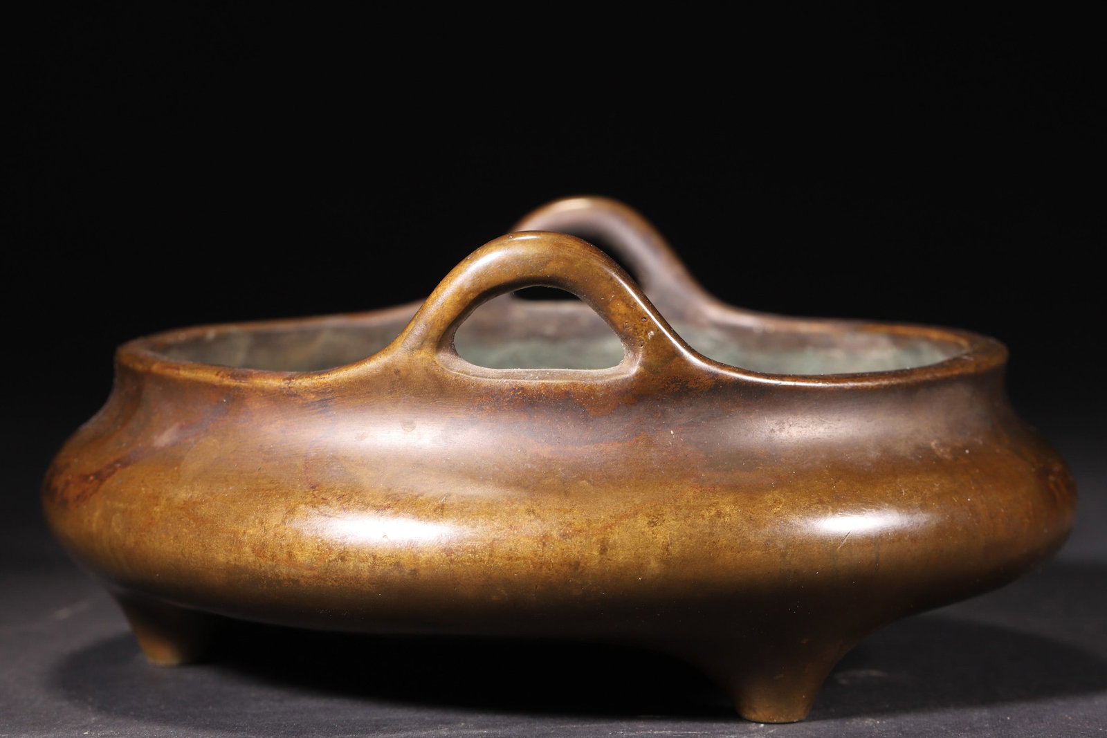 A Qing Dynasty Bronze Incense Burner with Three Legs and Upright Handles - 5