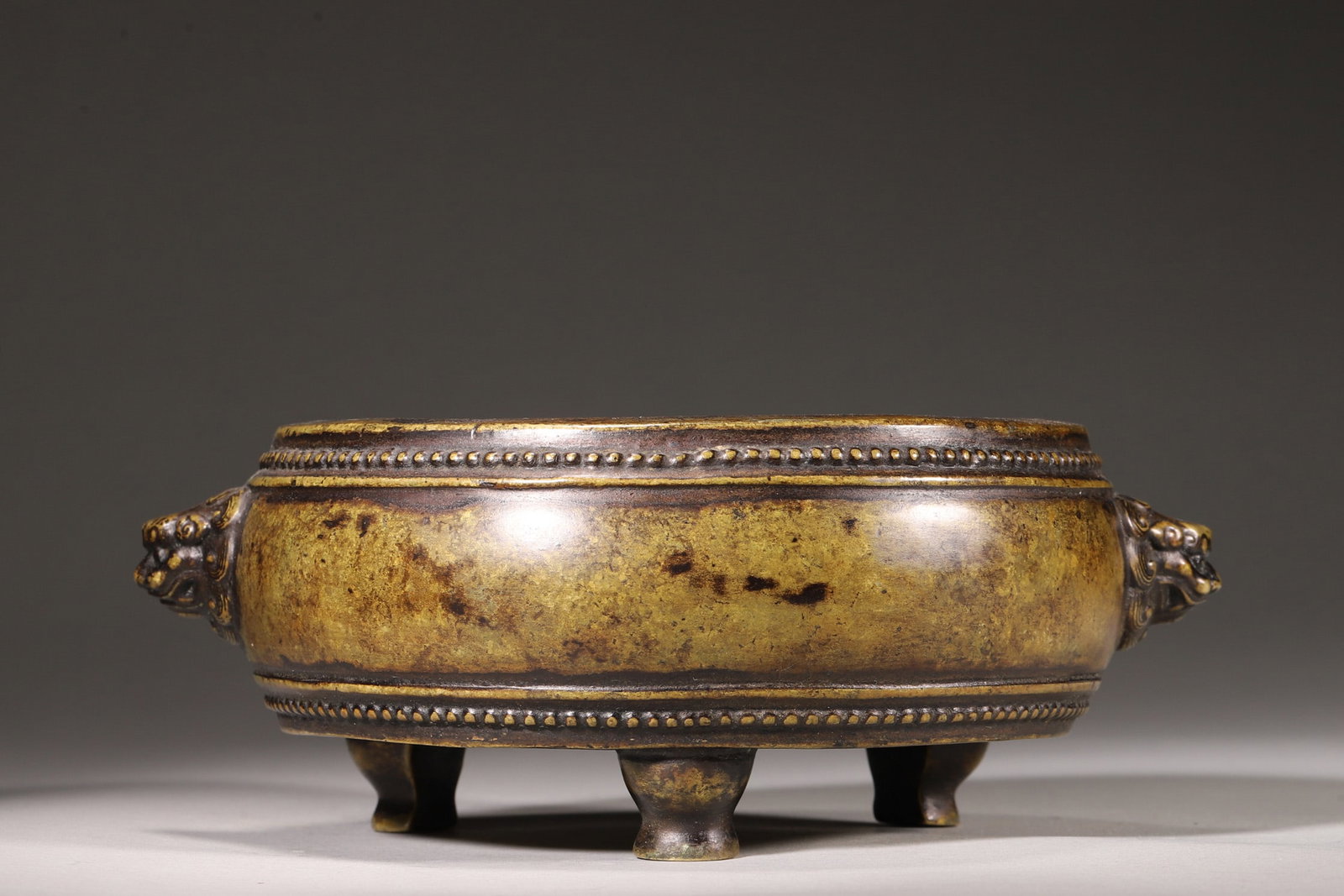 A Drum-Shaped Bronze Incense Burner with Lion Handles, Qing Dynasty (1 of 8)