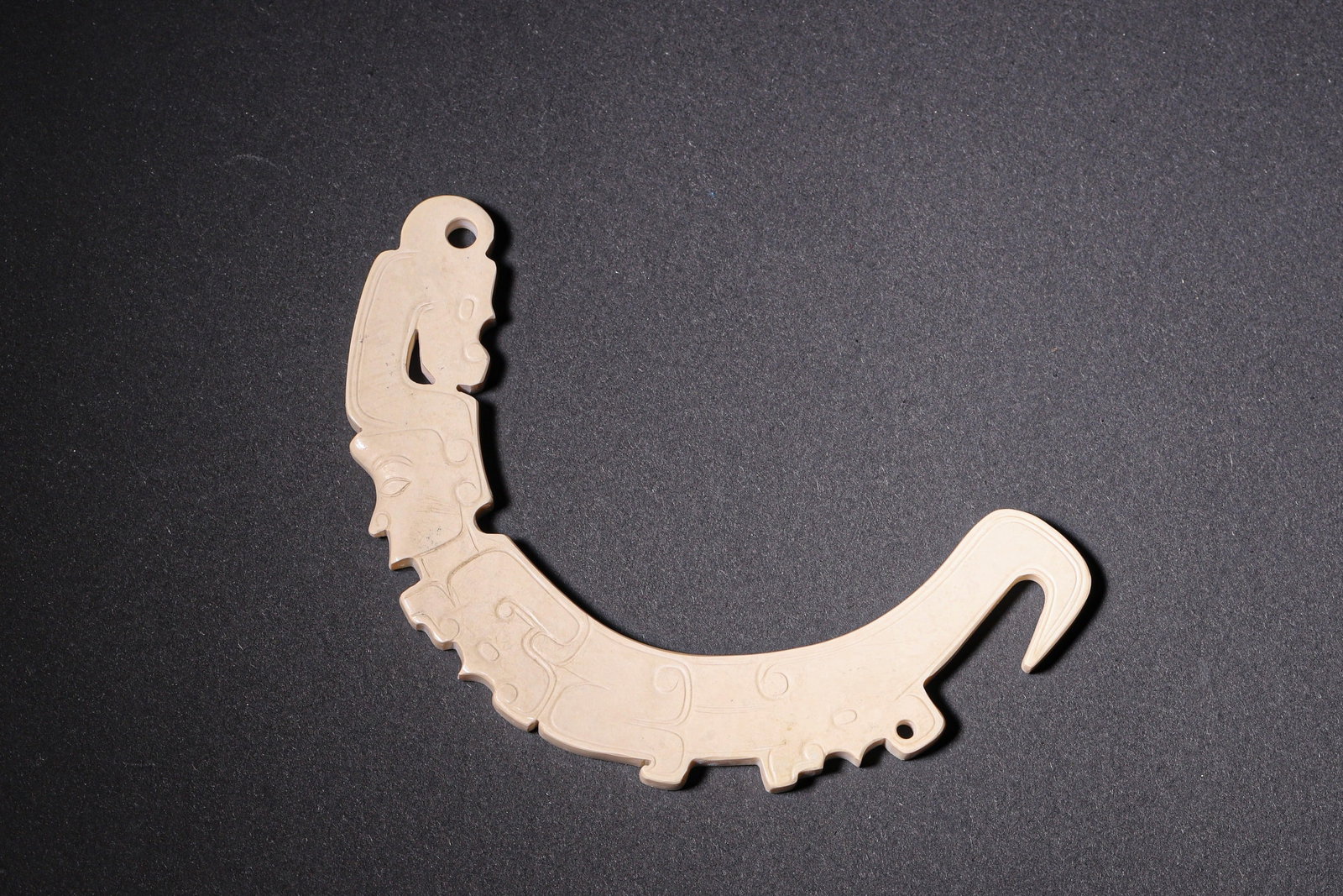 An Ancient Jade Pendant with Human and Dragon Motif - Shang-Zhou Dynasty (1 of 7)