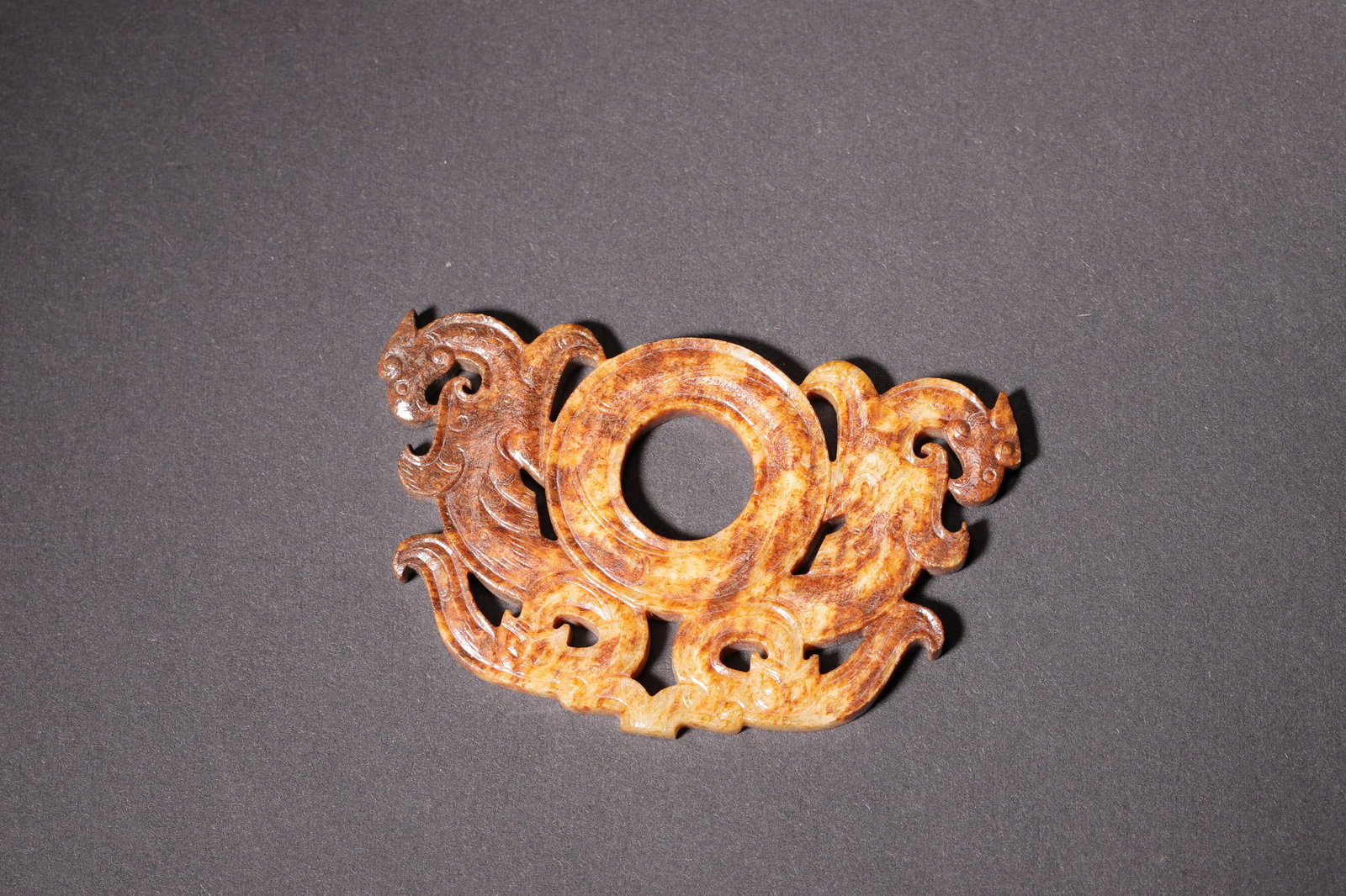 A Hetian Jade Bi-Shaped Pendant with Double Phoenix Pattern - Han Dynasty (1 of 6)