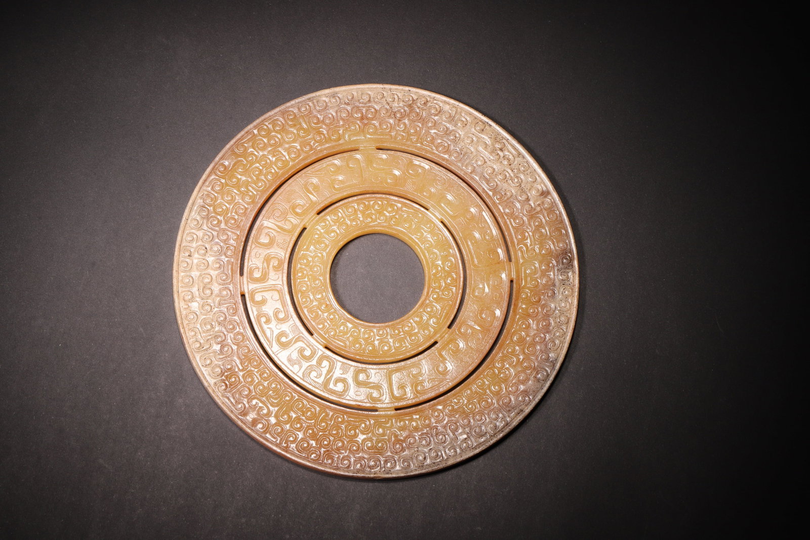 A Hetian Jade Bi Disc with Triple Concentric Circle Patterns - Han Dynasty (1 of 7)