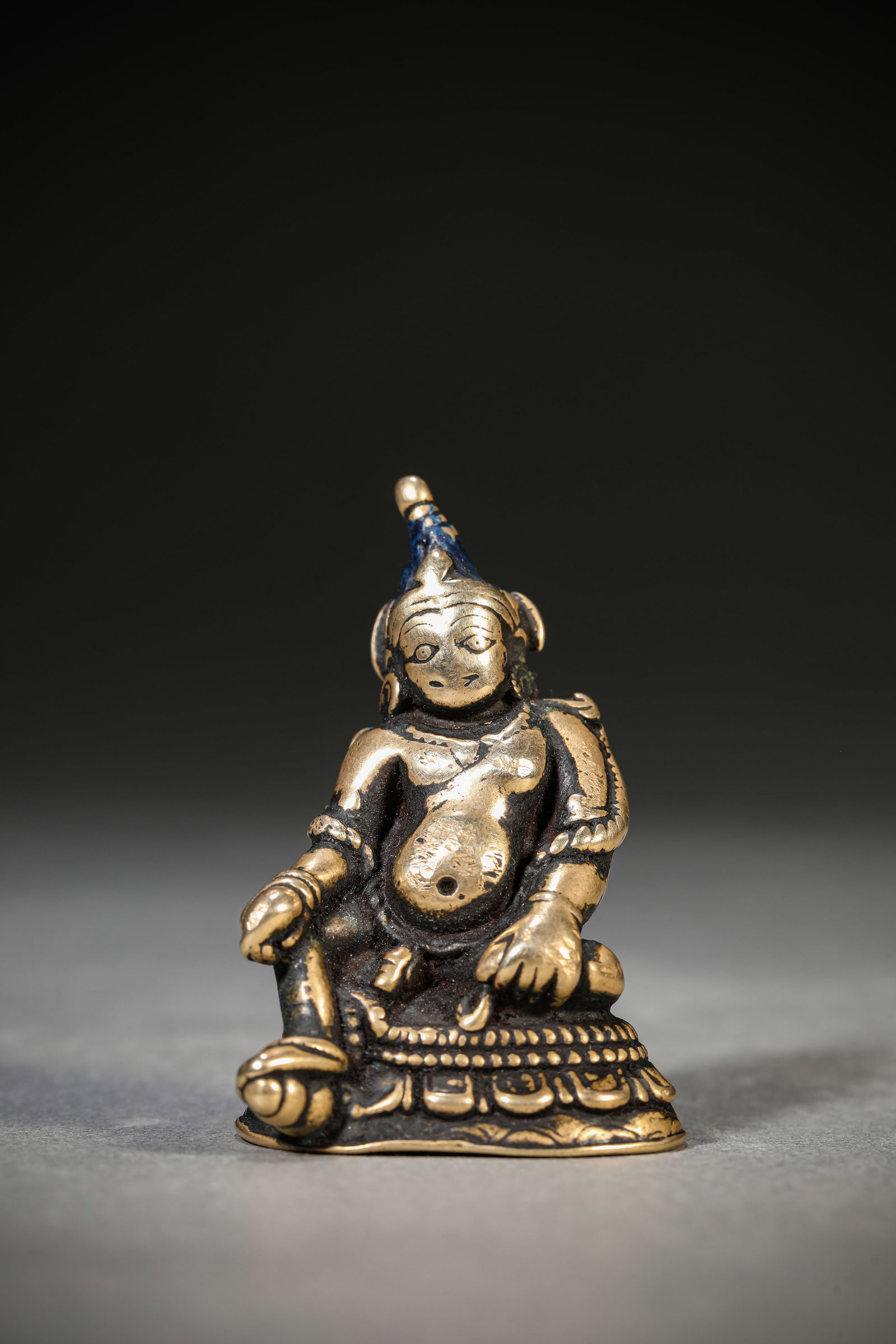 A ??Pala-Style?? Figure of Yellow Jambhala: Dimensions: Weight: 93g. Length: 3.8 cm (1.50 in) x Width: 2.8 cm (1.10 in) x Height: 5.5 cm (2.17 in). All measurements are approximate.