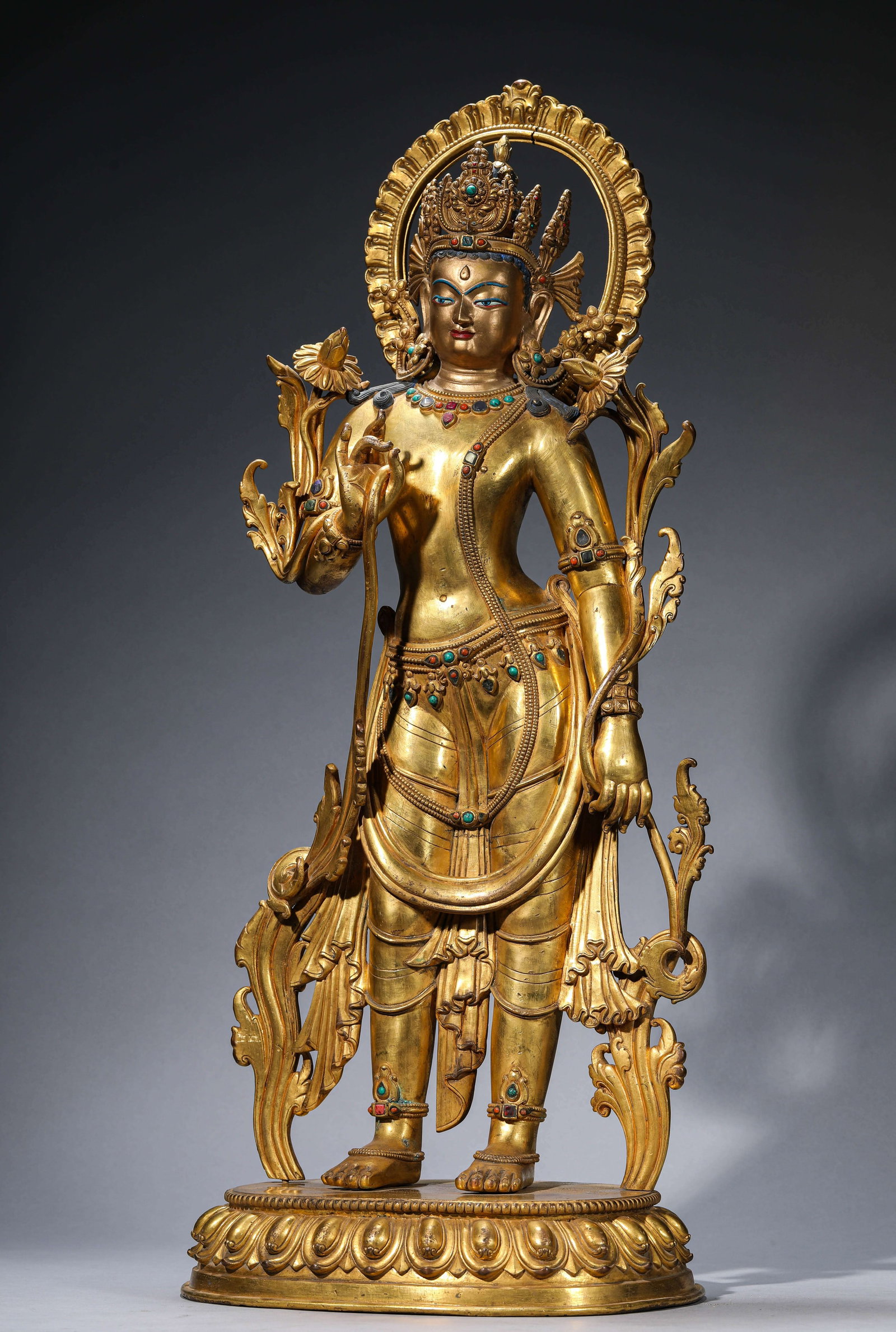 A Gilt-Bronze Figure of Padmapani: Dimensions: Weight: 19.65kg. Length: 31.0 cm (12.20 in) x Width: 23.5 cm (9.25 in) x Height: 77.0 cm (30.31 in). All measurements are approximate.