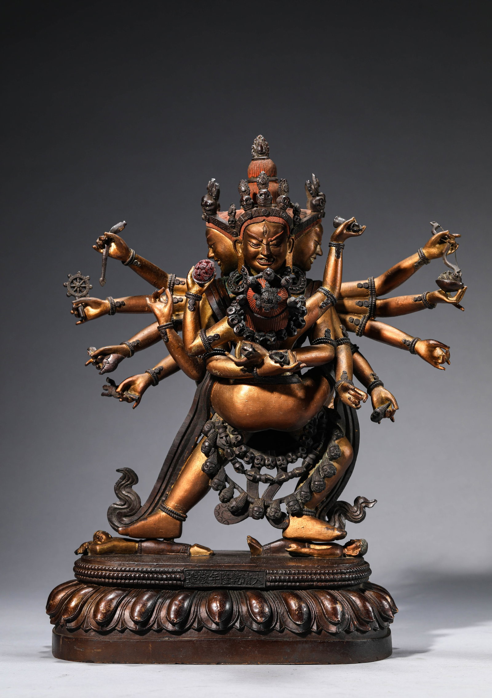 A Lacquered and Gilt-Bronze Figure of Heruka: Dimensions: Weight: 15.15kg. Length: 30.0 cm (11.81 in) x Width: 21.0 cm (8.27 in) x Height: 40.0 cm (15.75 in). All measurements are approximate.