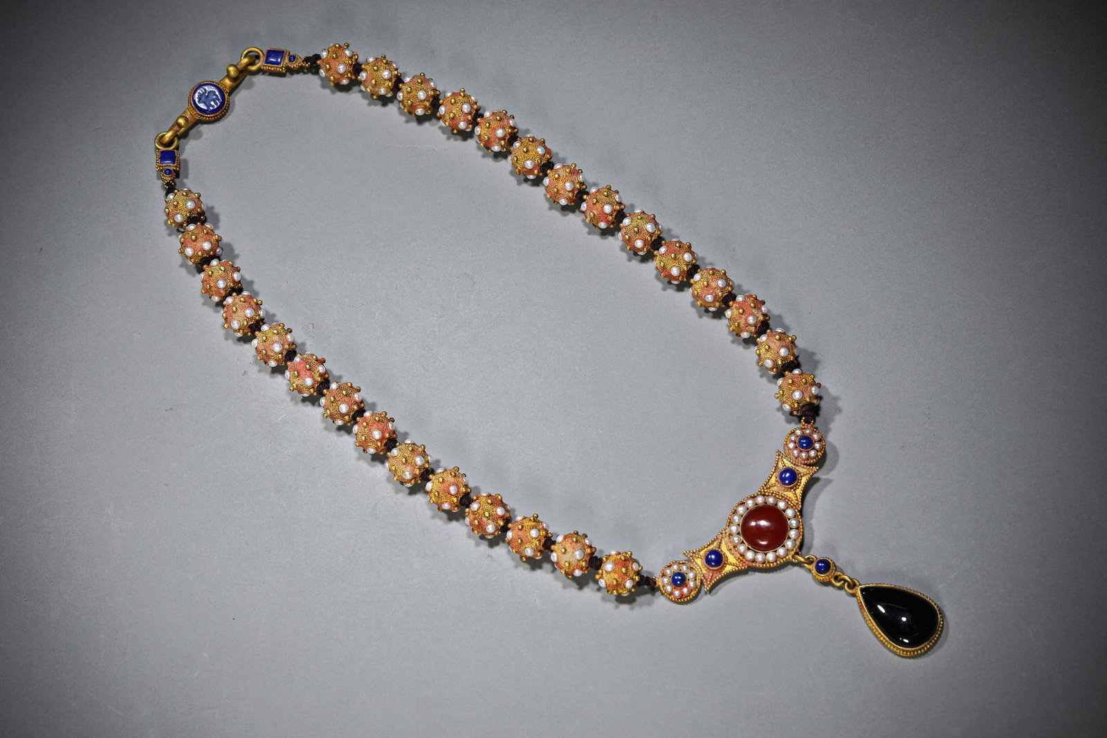 A Gilt-Silver and Gem-Set Necklace: Dimensions: Weight: 246g. Length: 33.0 cm (12.99 in). All measurements are approximate.