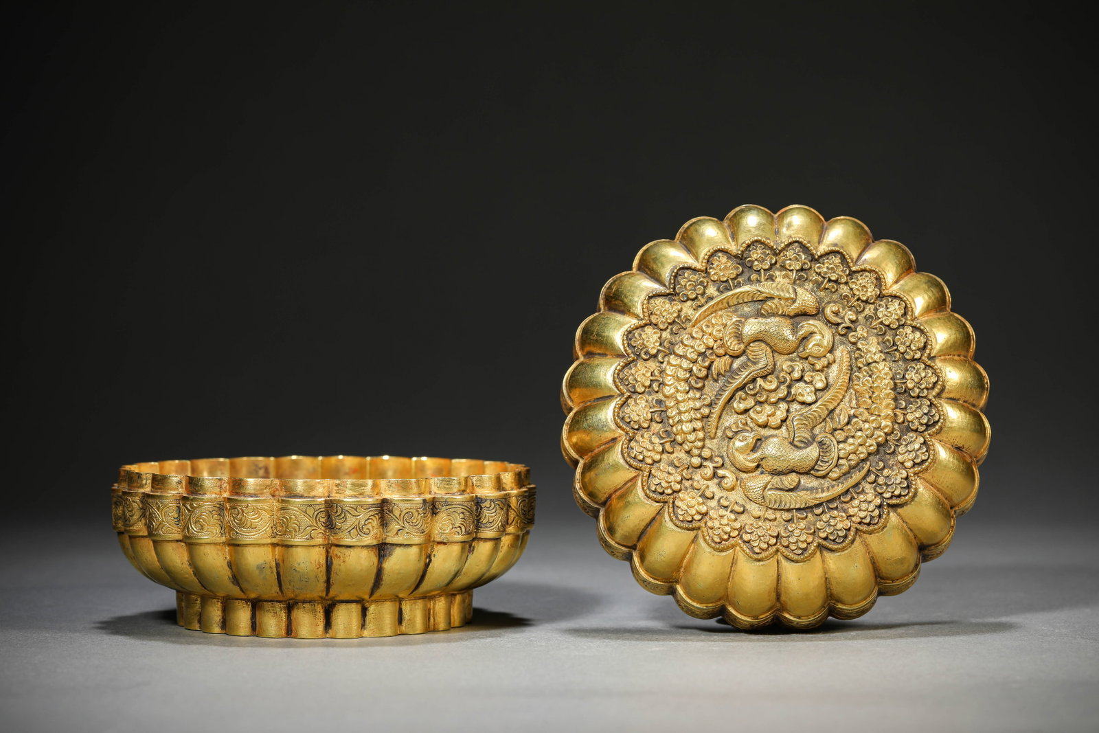 A Gilt-Silver 'Phoenix' Covered Box: Dimensions: Weight: 292g. Width: 10.8 cm (4.25 in) x Height: 6.5 cm (2.56 in). All measurements are approximate.