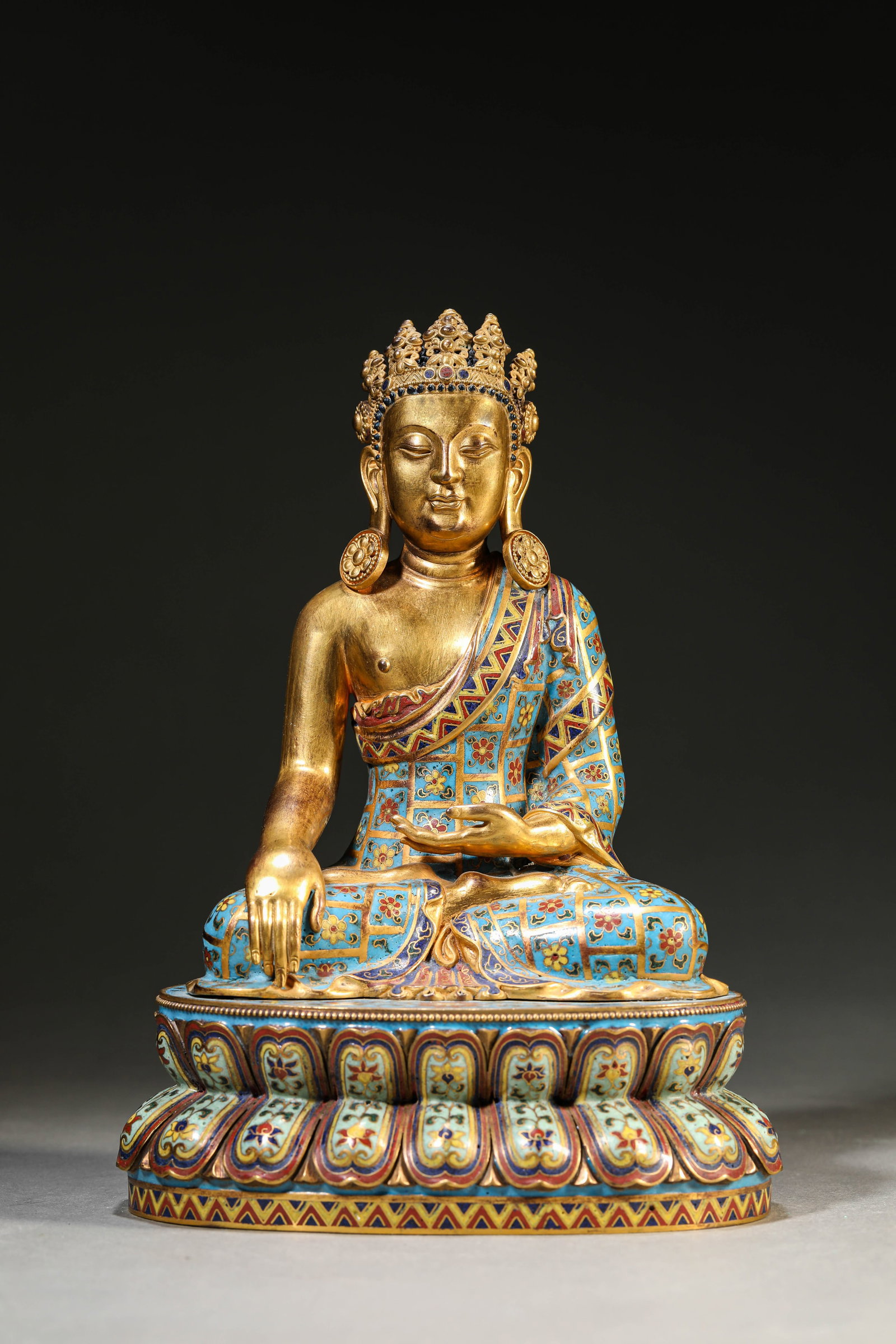 A Cloisonn?? Enamel Figure of Amitayus: Dimensions: Weight: 1355g. Length: 17.0 cm (6.69 in) x Width: 12.8 cm (5.04 in) x Height: 23.5 cm (9.25 in). All measurements are approximate.