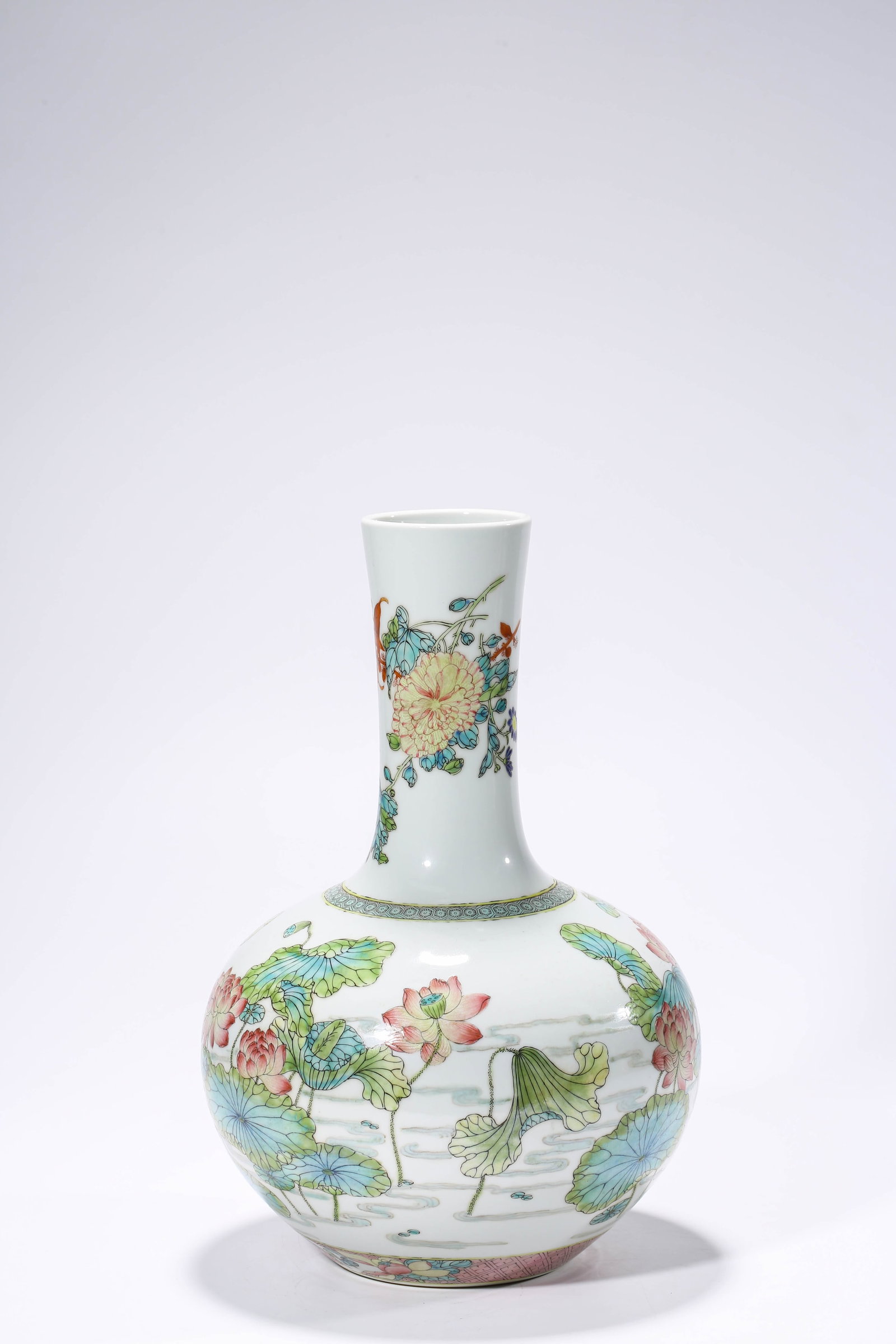 A Famille-Rose ??Spring Begonia?? Small Celestial Globe Vase: Dimensions: Width: 21.2 cm (8.35 in) x Height: 32.4 cm (12.76 in). All measurements are approximate.