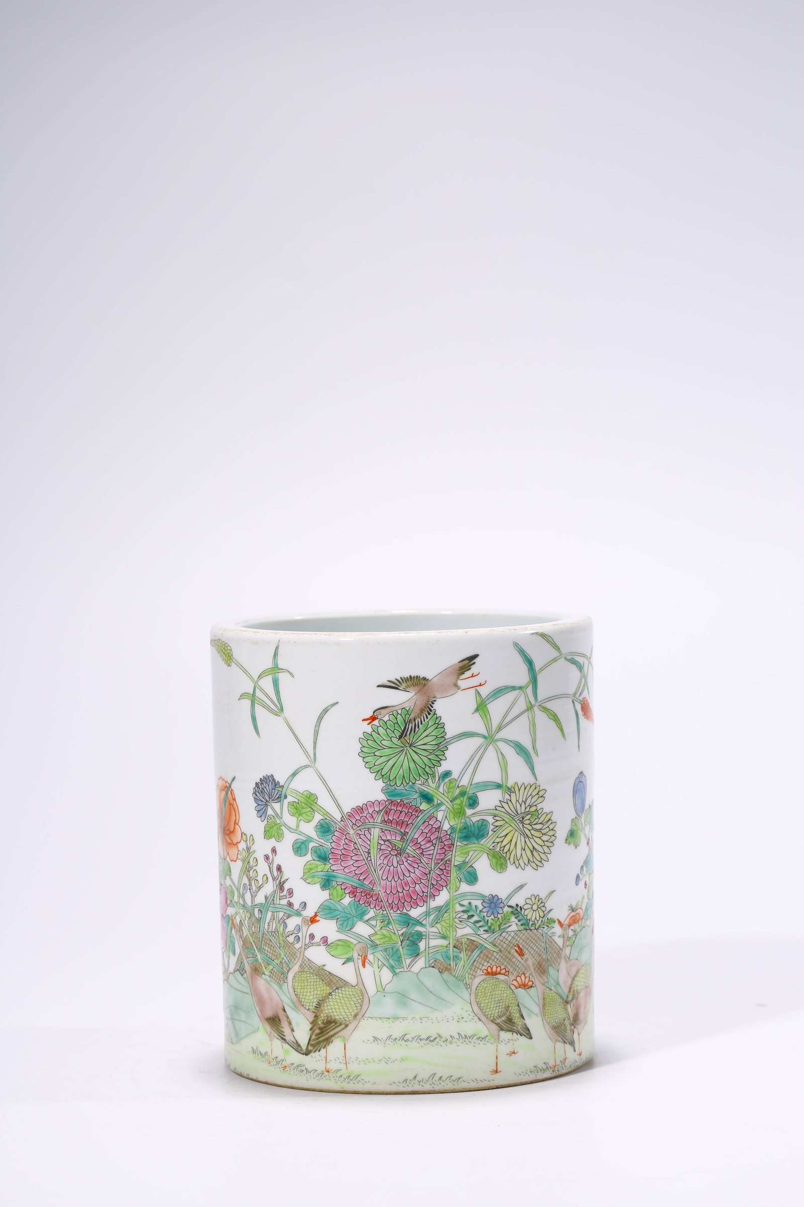 A Famille-Rose ??Flowers and Birds?? Brush Pot: Dimensions: Width: 12.7 cm (5.00 in) x Height: 14.3 cm (5.63 in). All measurements are approximate.