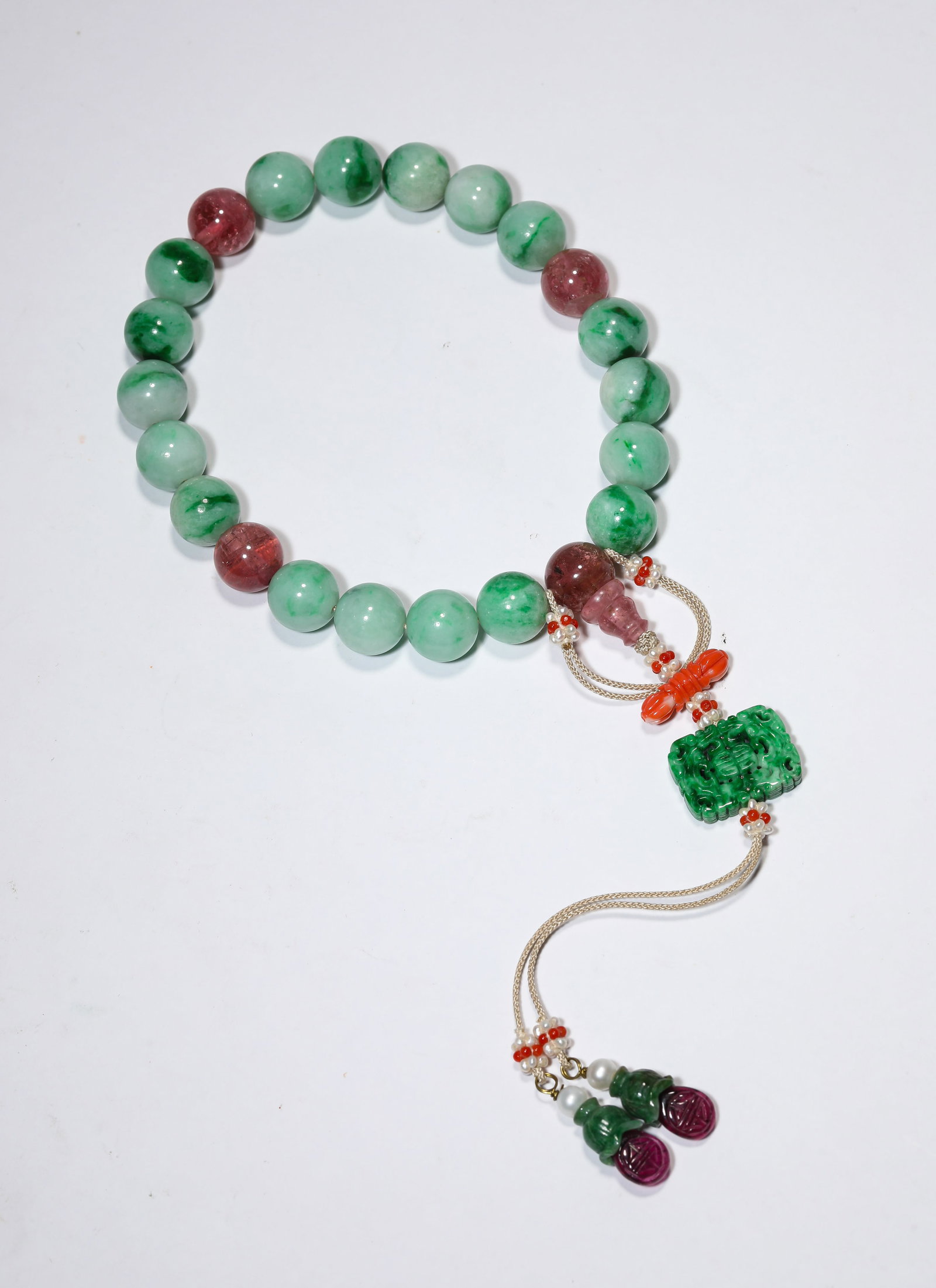 A Jadeite 'Eighteen-Bead' Bracelet: Dimensions: Width: 1.3 cm (0.51 in). All measurements are approximate.