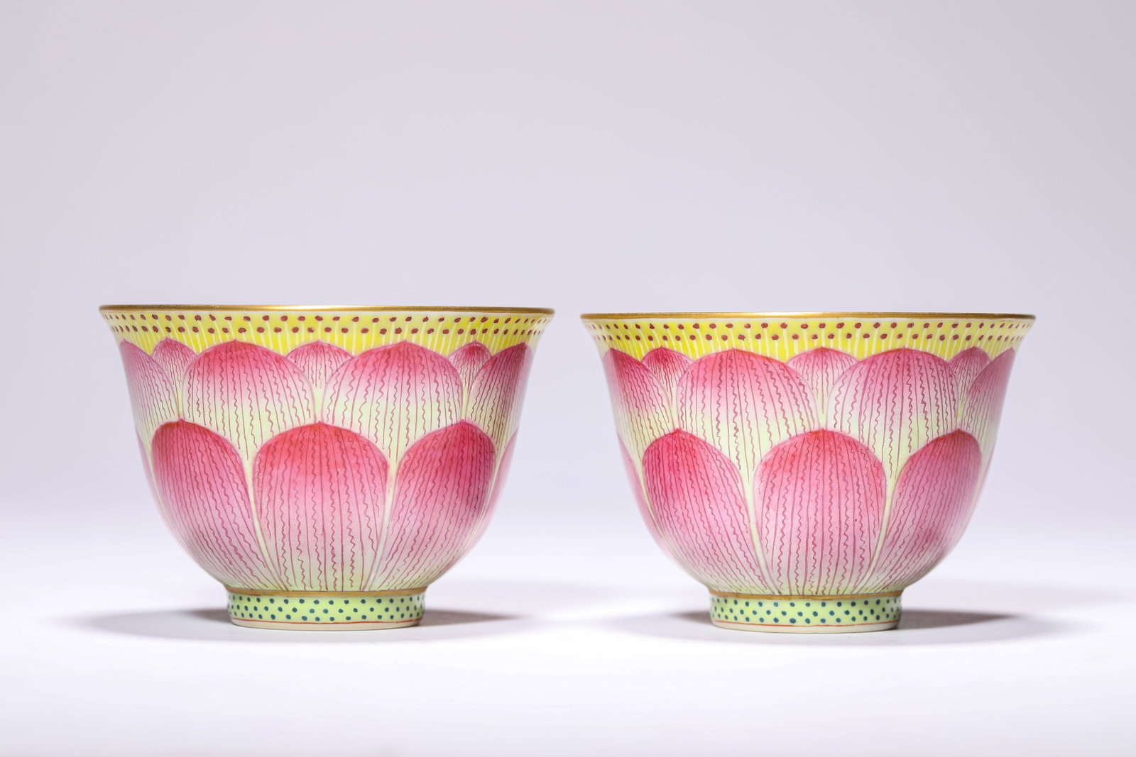 A Pair of Famille-Rose 'Lotus' Cups: Dimensions: Width: 9.0 cm (3.54 in) x Height: 6.3 cm (2.48 in). All measurements are approximate.