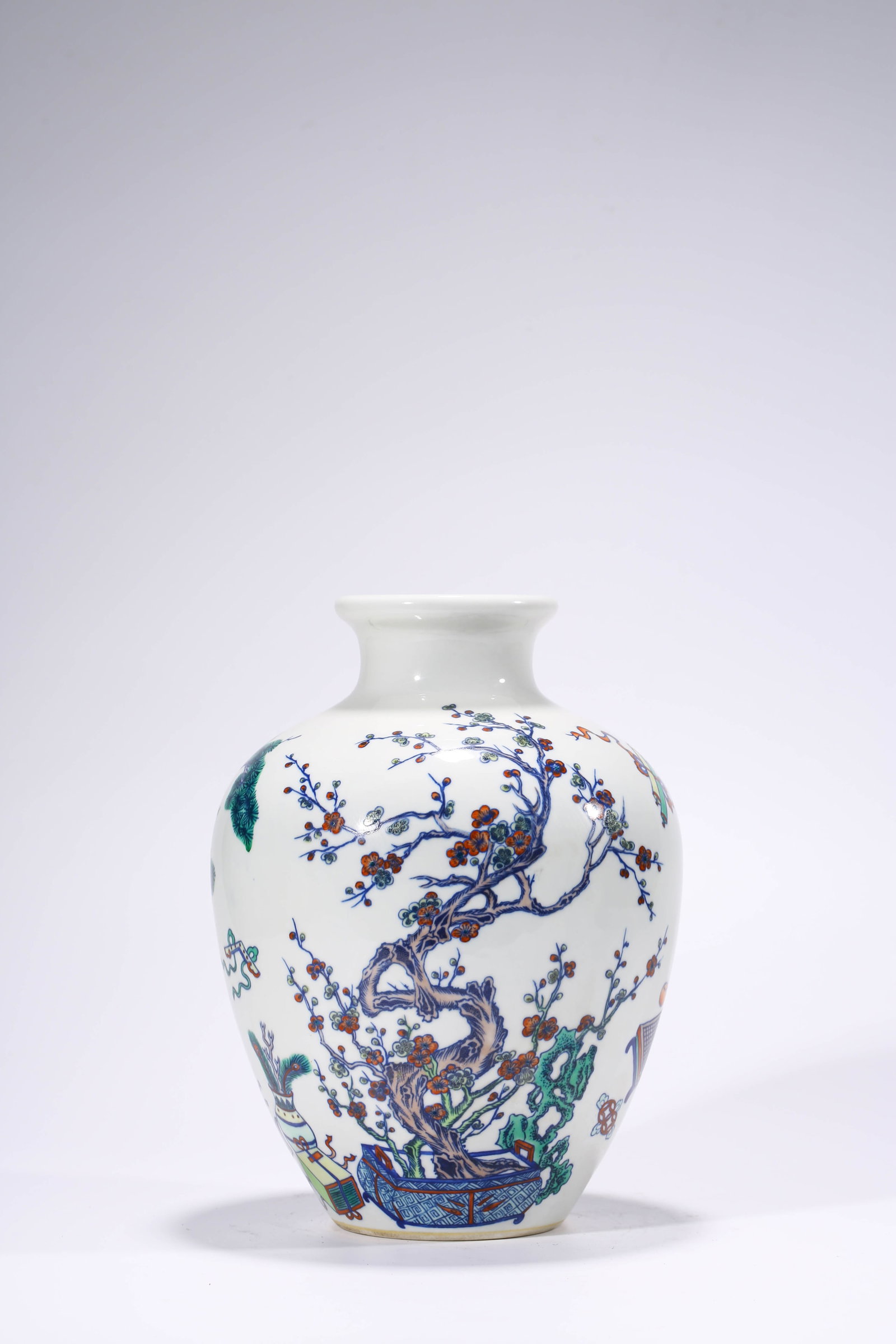 A Doucai ??Scholarly Emblems and Auspicious Symbols?? Jar: Dimensions: Width: 21.6 cm (8.50 in) x Height: 29.1 cm (11.46 in). All measurements are approximate.