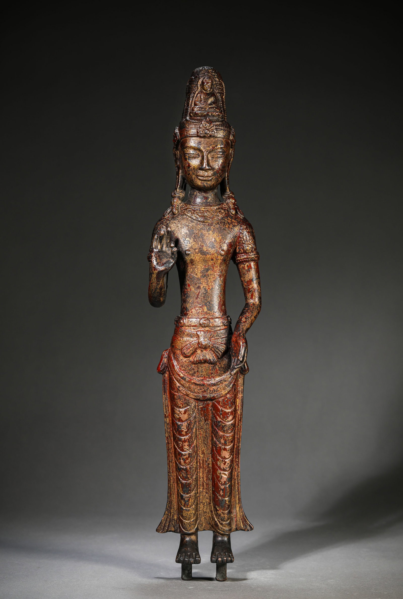 A Lacquered and Gilt-Bronze Figure of Buddha: Dimensions: Weight: 2070g. Length: 8.8 cm (3.46 in) x Width: 5.2 cm (2.05 in) x Height: 40.2 cm (15.83 in). All measurements are approximate.