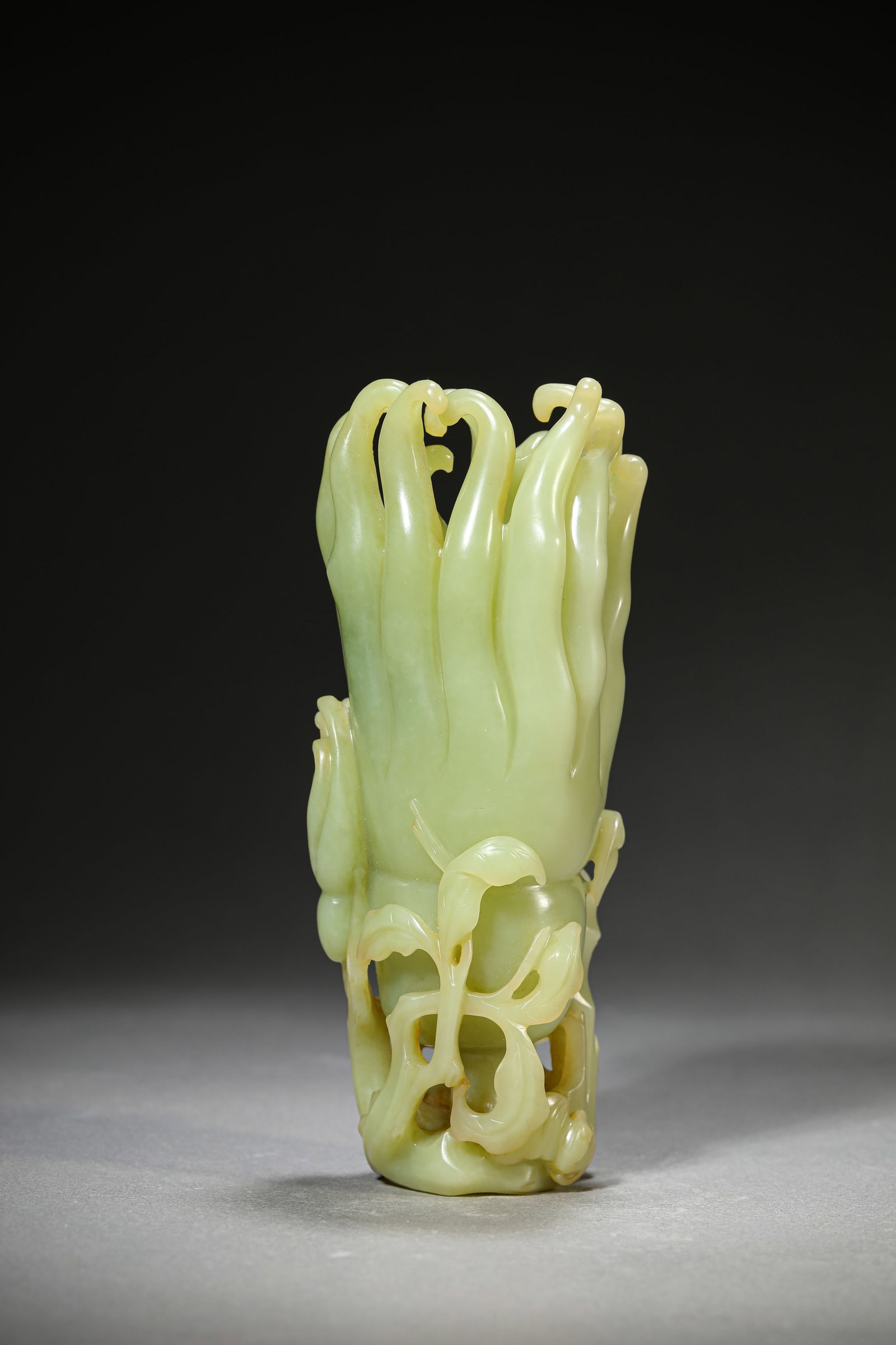 A Jade 'Fingered Citron' Ornament: Dimensions: Length: 6.7 cm (2.64 in) x Width: 5.1 cm (2.01 in) x Height: 16.2 cm (6.38 in). All measurements are approximate.