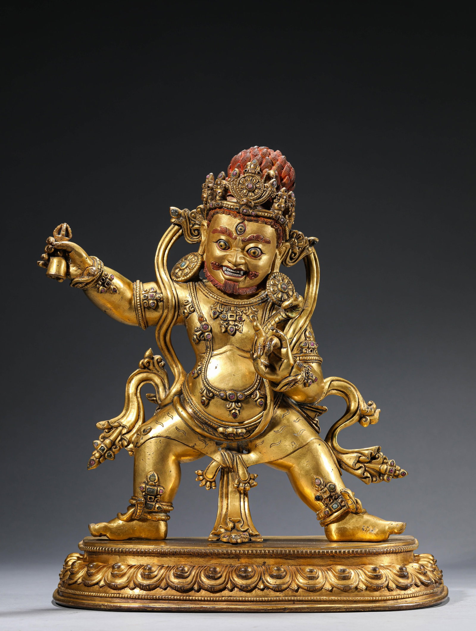 A Gilt-Bronze Figure of Vajrapani: Dimensions: Weight: 7.3kg. Length: 30.5 cm (12.01 in) x Width: 17.0 cm (6.69 in) x Height: 35.5 cm (13.98 in). All measurements are approximate.