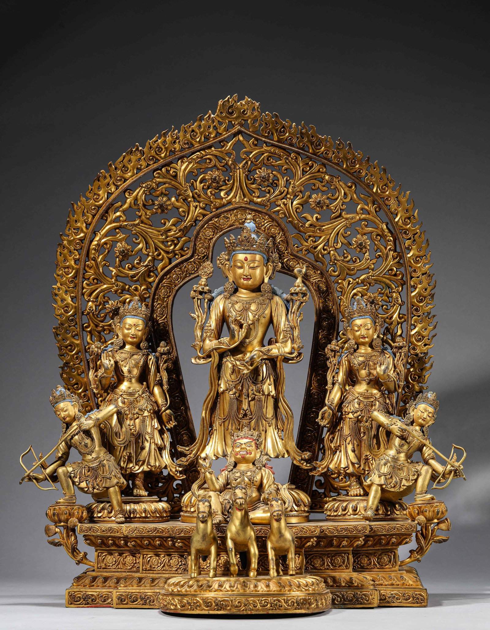 A Gilt-Bronze Figure of Buddha: Dimensions: Weight: 23.85kg. Length: 39.0 cm (15.35 in) x Width: 31.5 cm (12.40 in) x Height: 57.0 cm (22.44 in). All measurements are approximate.