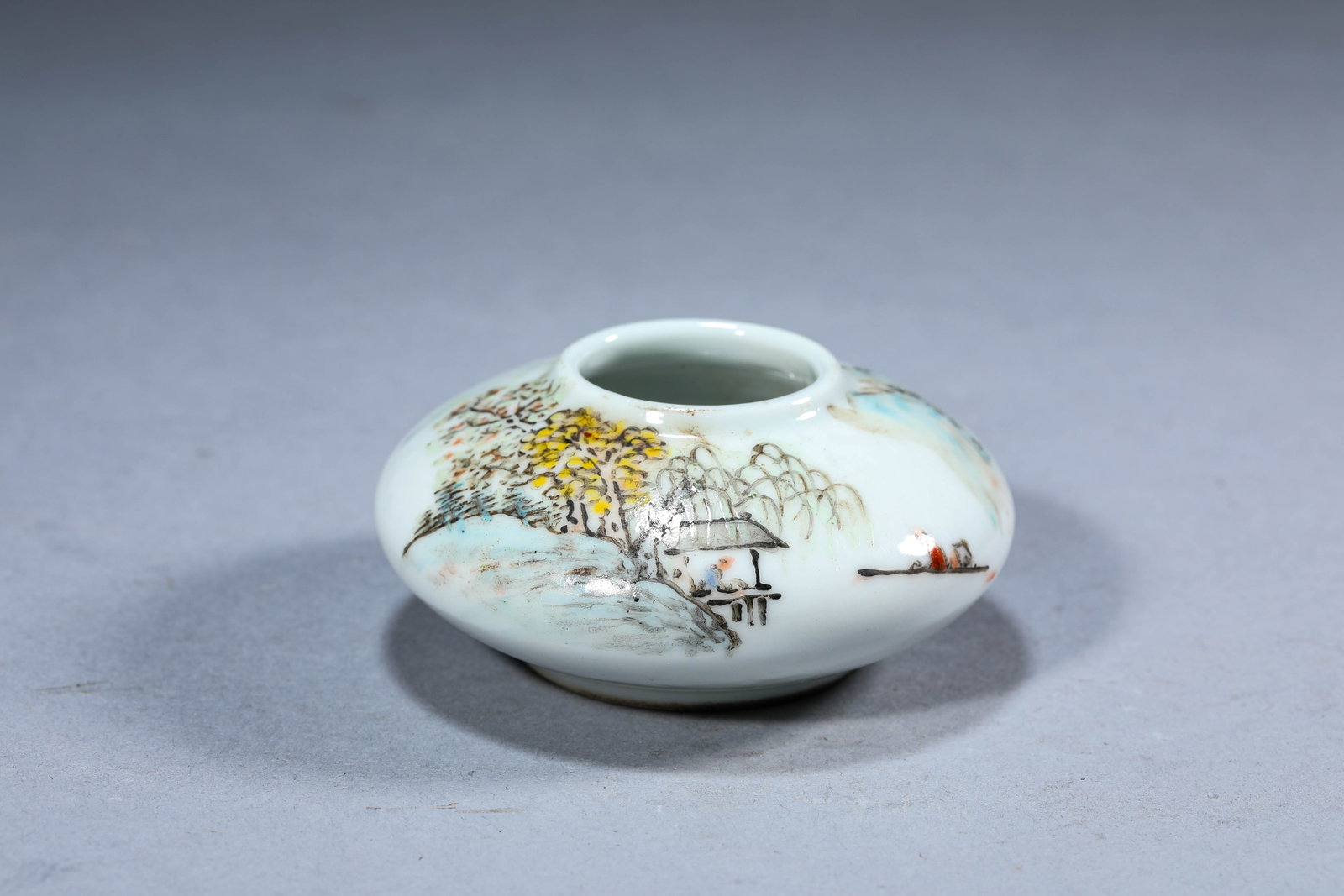 A Qianjiangcai 'Landscape, Figures and Poem' Water Pot: Dimensions: Width: 8.5 cm (3.35 in) x Height: 4.0 cm (1.57 in). All measurements are approximate.