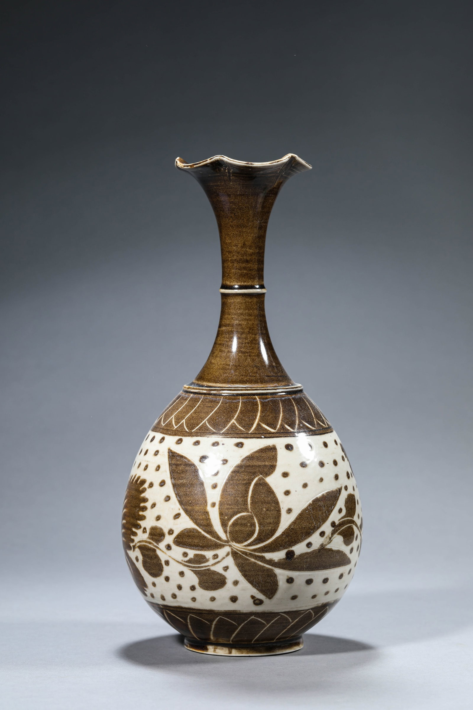 A Ding-Type 'Floral' 'Sunflower-Mouth' Vase: Dimensions: Width: 14.4 cm (5.67 in) x Height: 30.0 cm (11.81 in). All measurements are approximate.