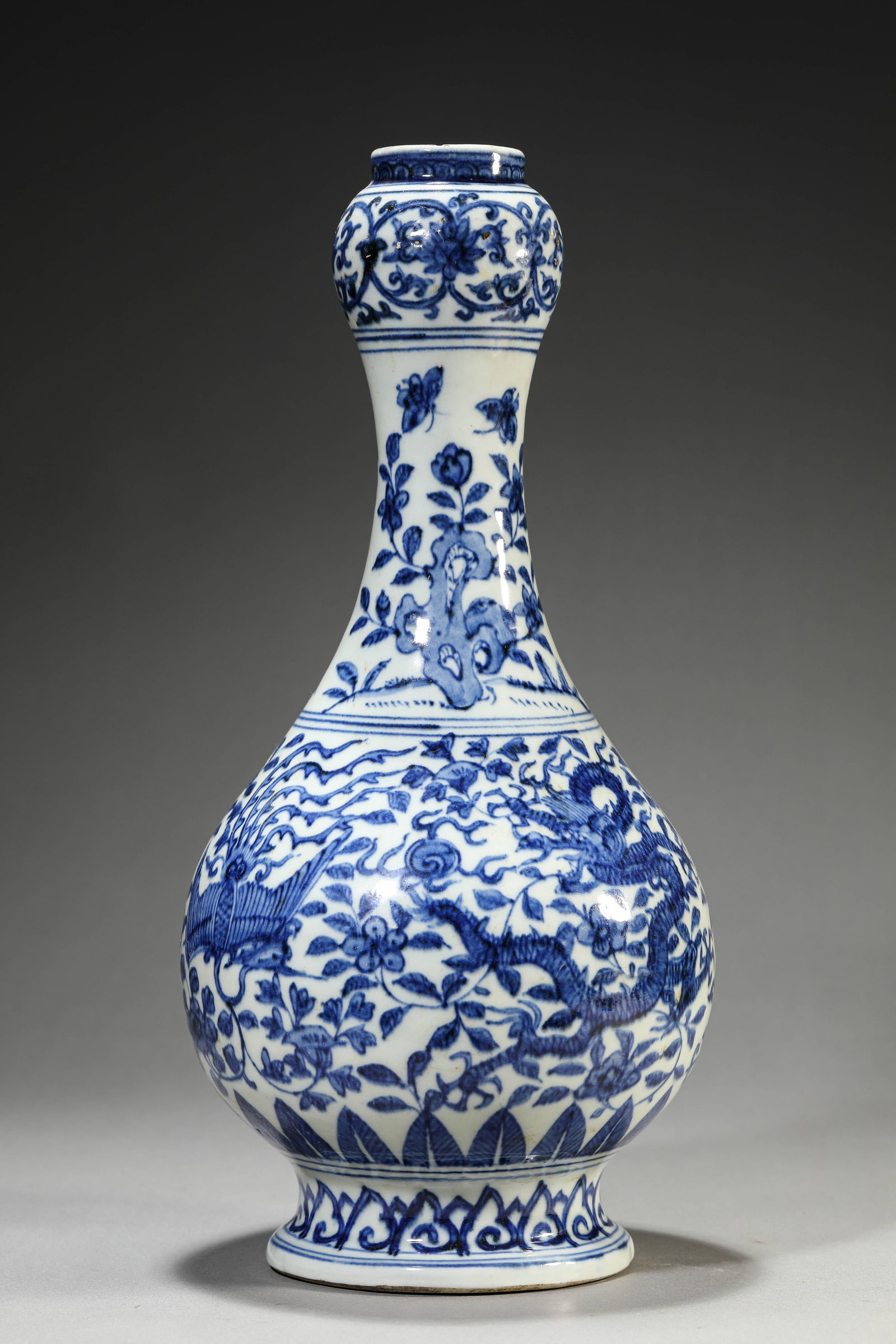 A Blue and White 'Dragon and Phoenix' 'Garlic-Head' Vase: Dimensions: Width: 16.2 cm (6.38 in) x Height: 36.6 cm (14.41 in). All measurements are approximate.
